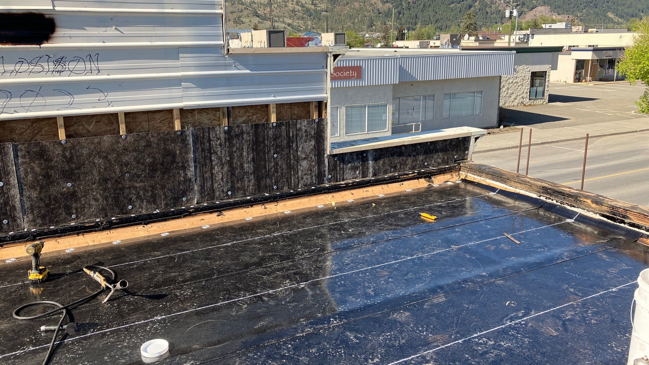 Commercial ReRoofing Installation using IKO 2ply sbs by Top Notch Roofing Inc