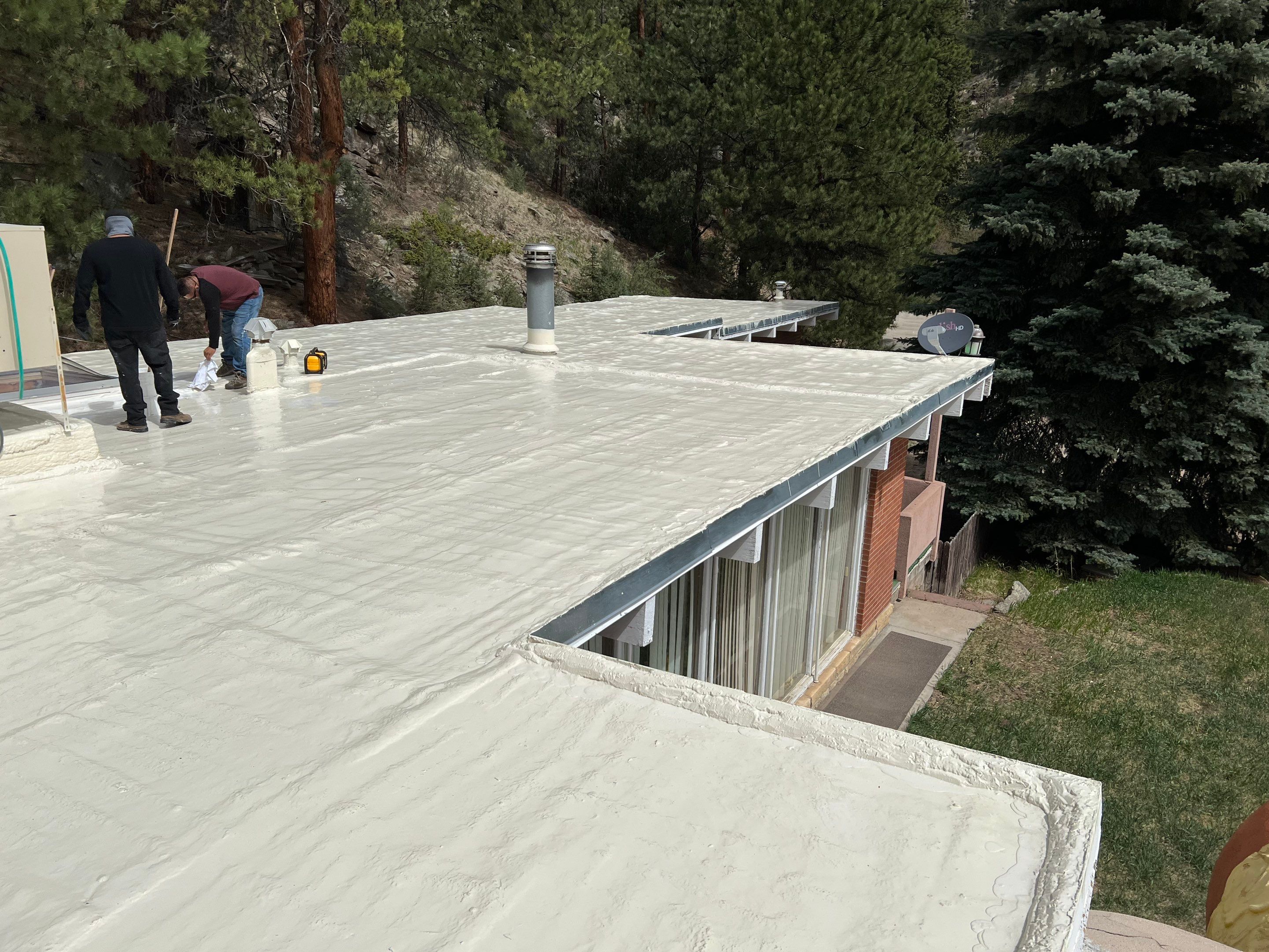 Commercial Roofing Installation using CASTAGRA ECODUR COATING by A to Z Roofing