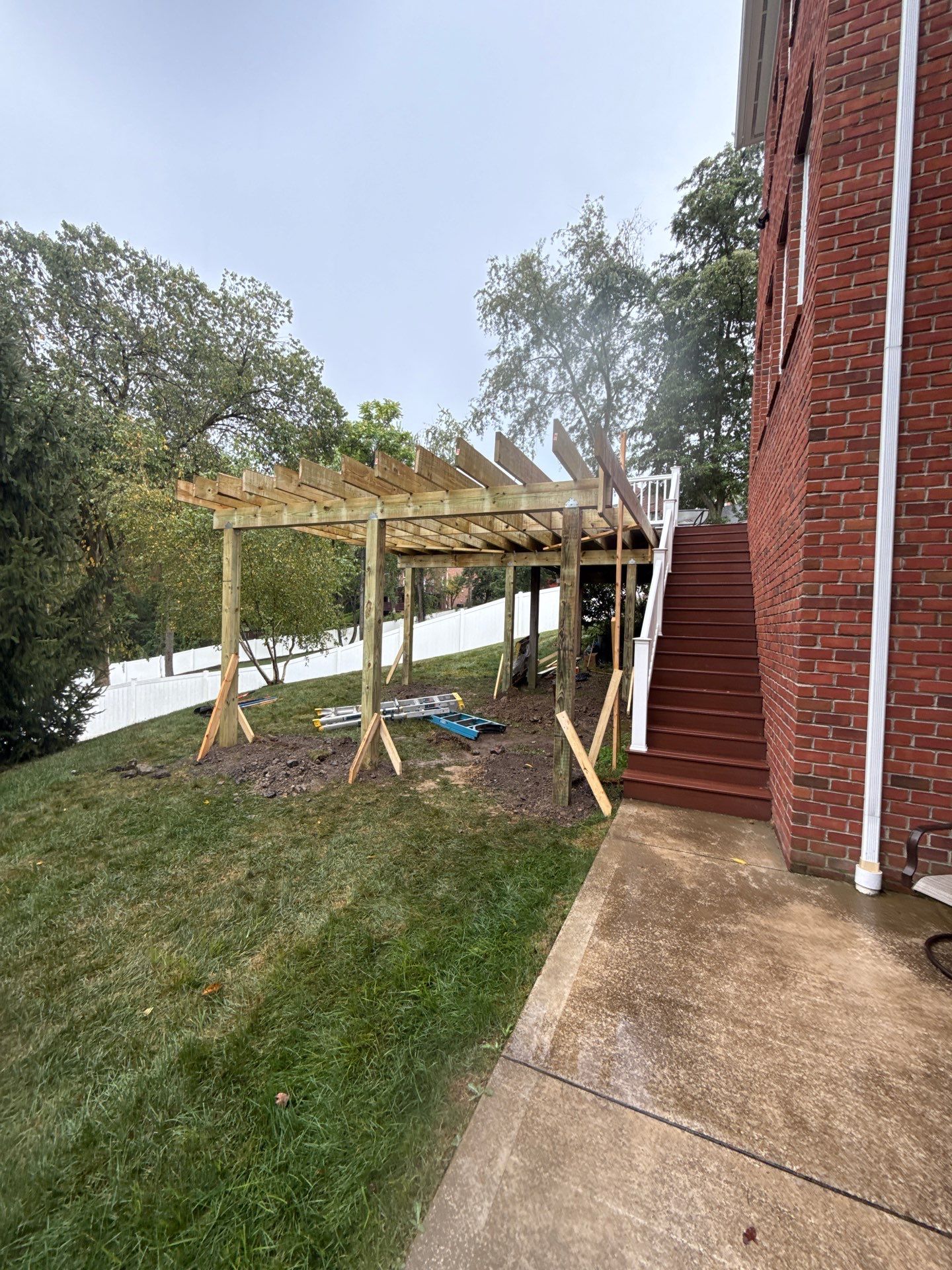 Deck extension  by Cousins Roofing Siding & Decks