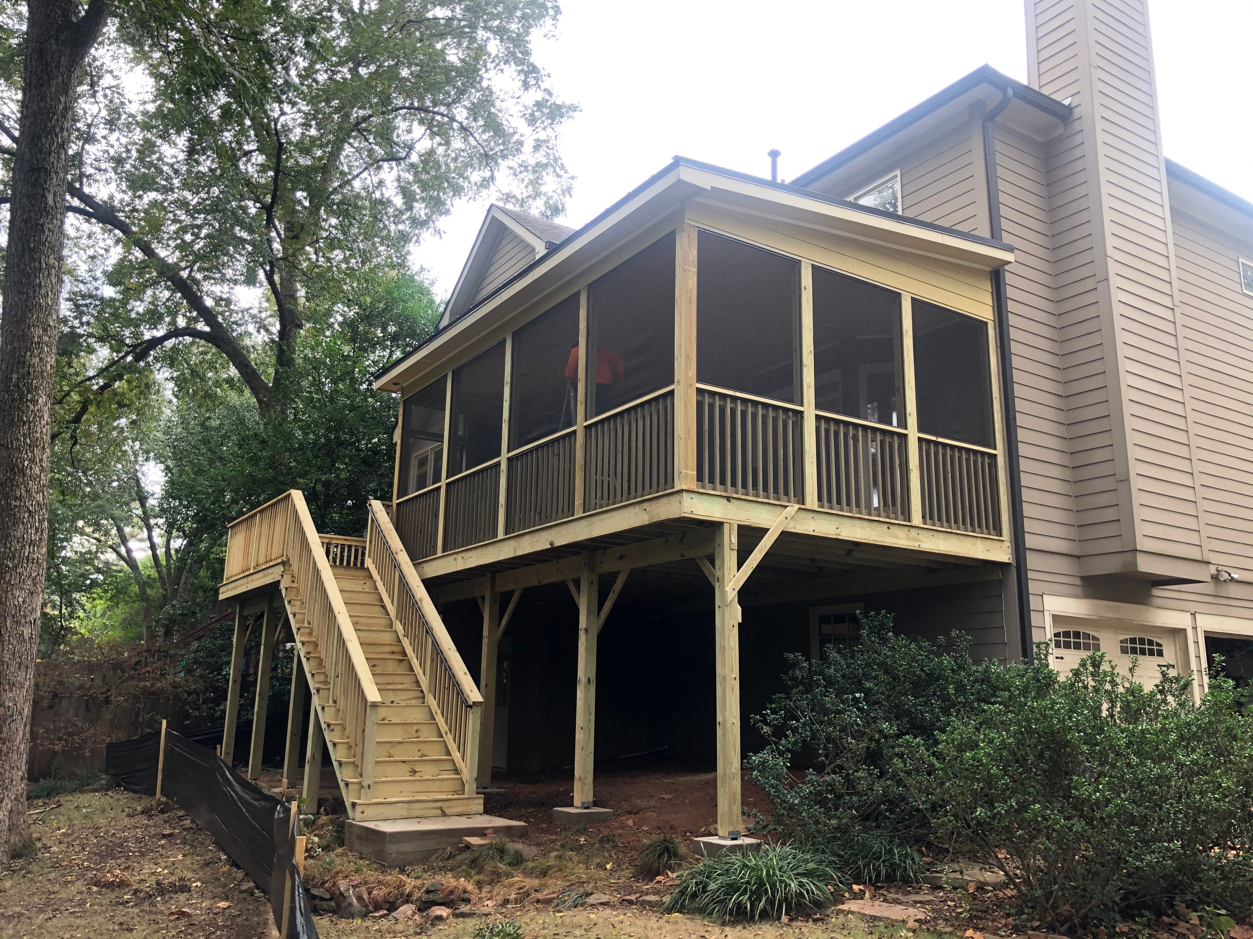 Elevated Screened-In Porch and Custom Wood Deck in Decatur by Swift Home Renovations 