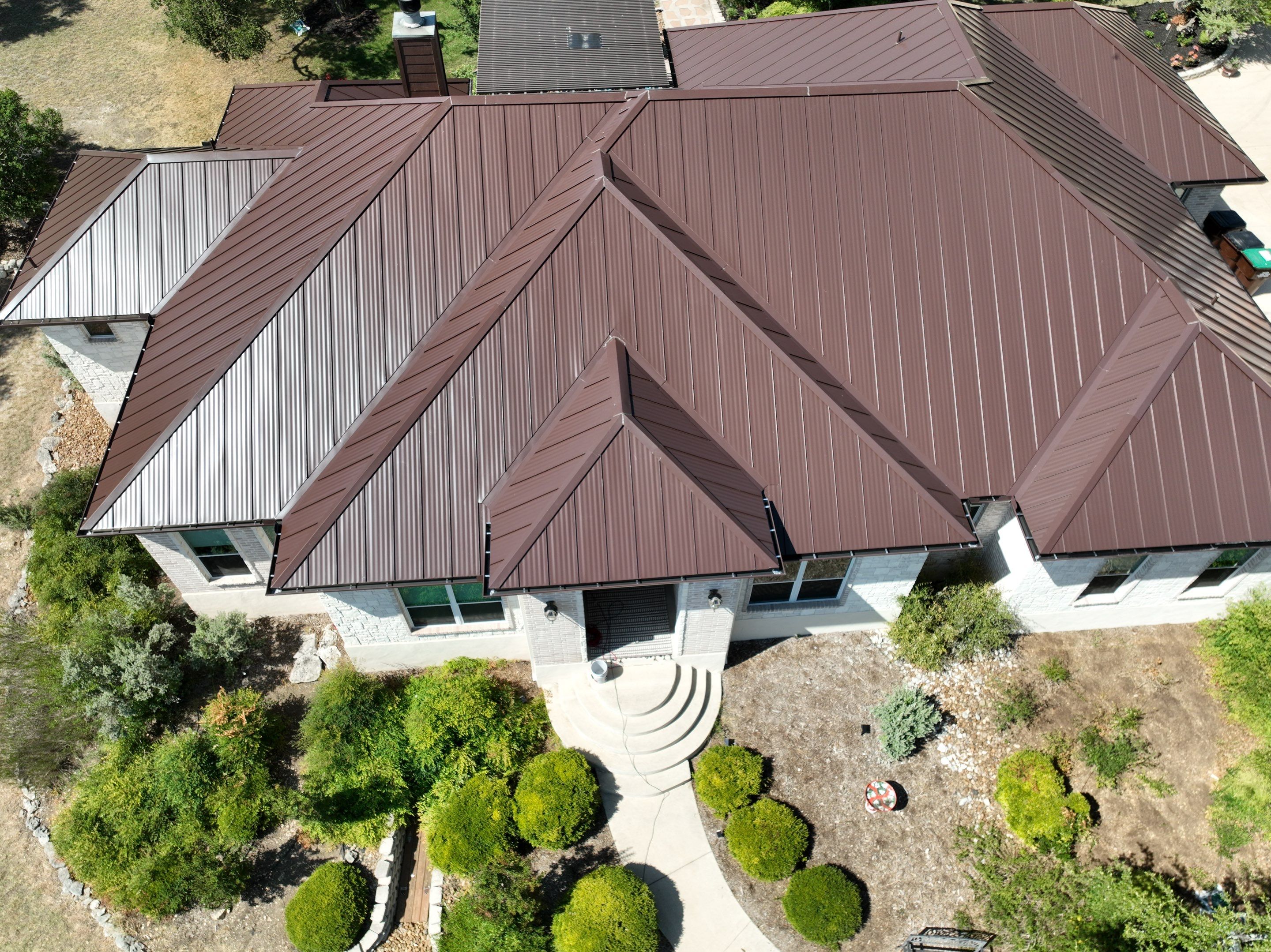 Residential Metal Roof Installation using McElroy Metal by Premier Roofing and Contracting