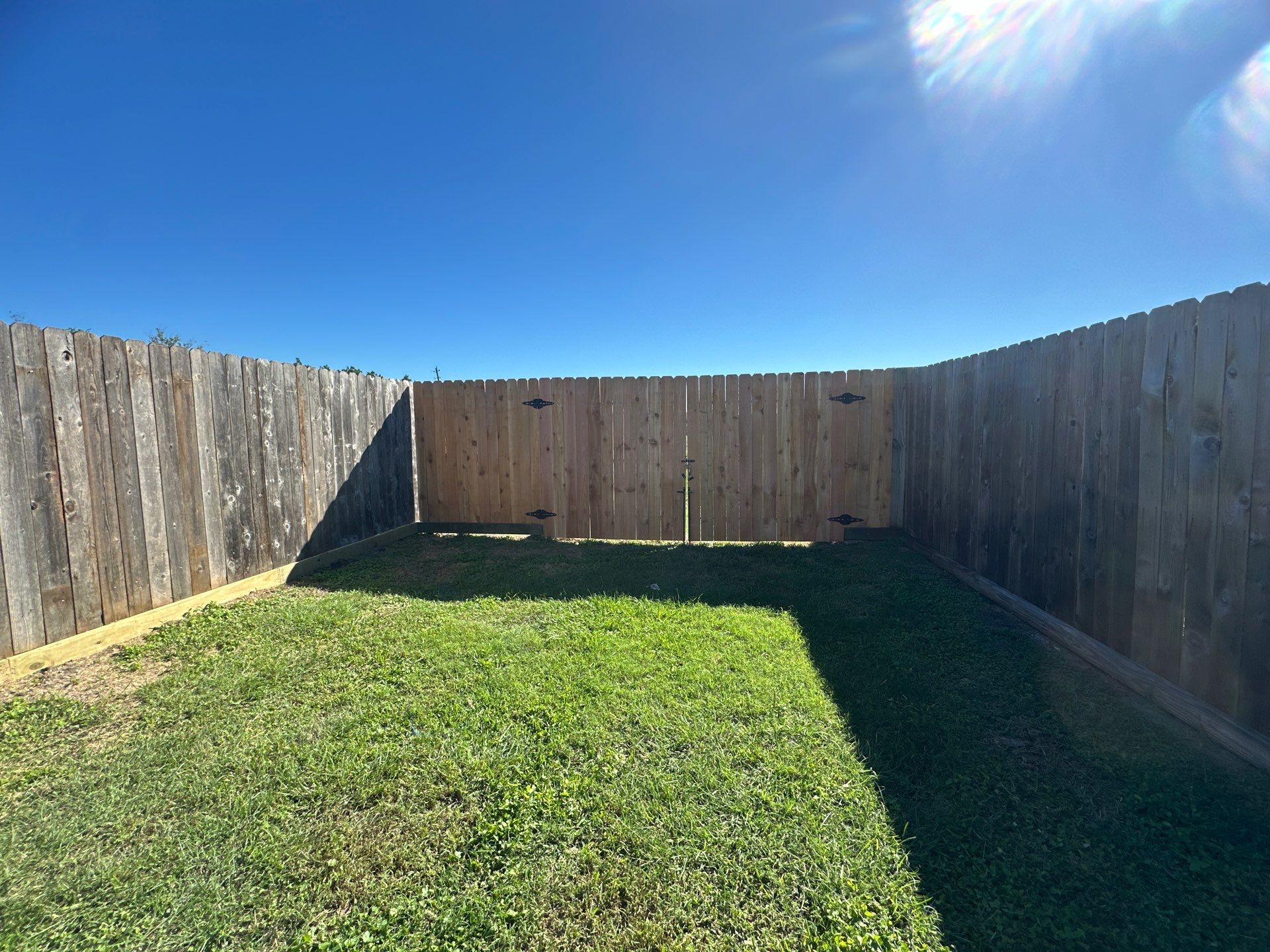 Premium Commercial Fence Installation with Western Red Cedar Pickets, 3 Rails, and Deluxe Wood Gates" by Tim's Fences