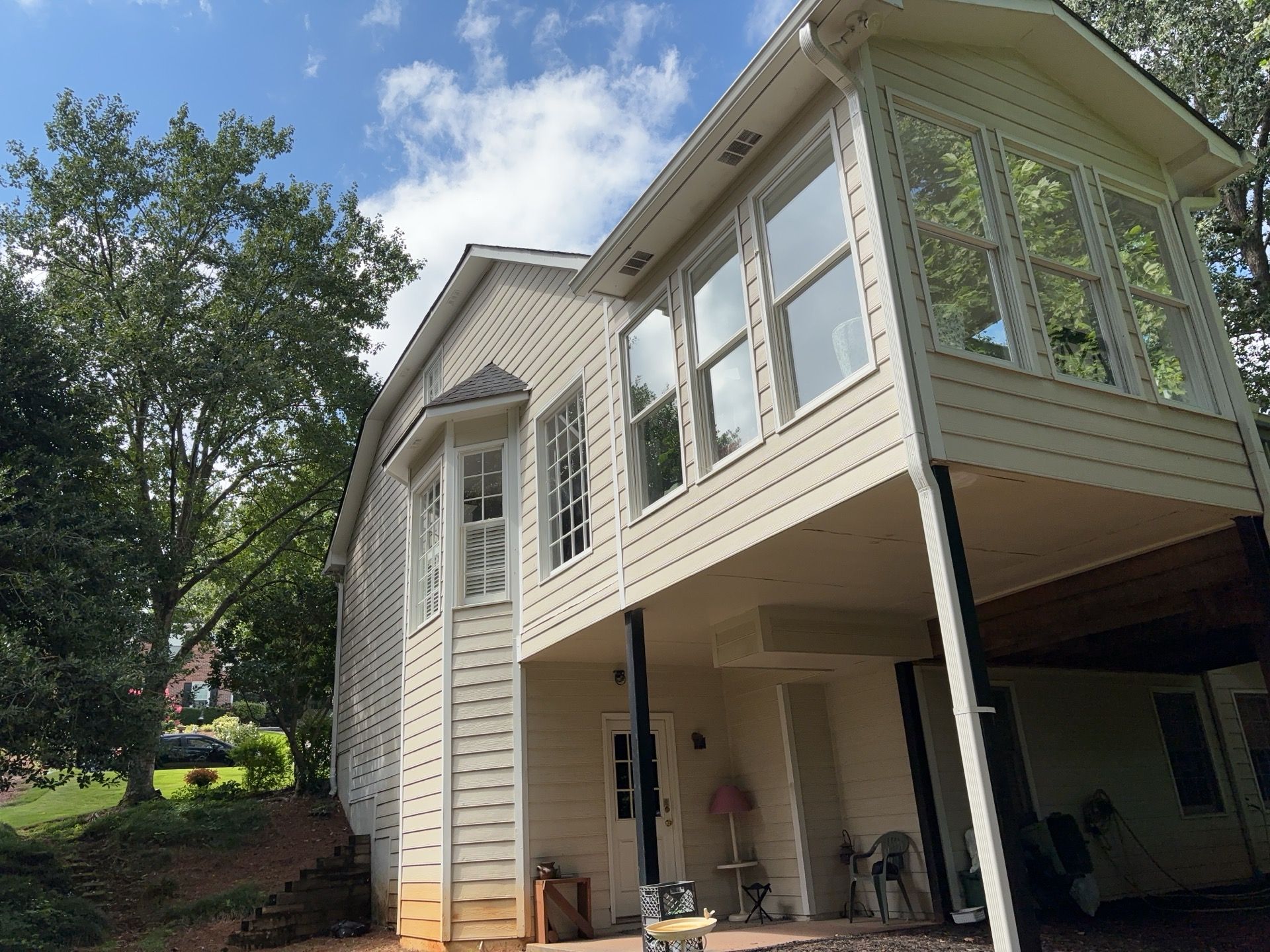 Blue Exterior Paint and Siding Installation using James Hardie Lap Siding by Nelson Exteriors