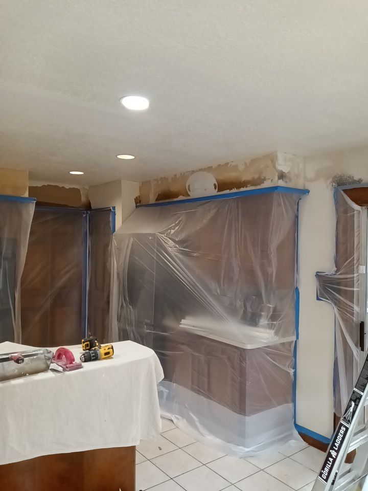 Interior and exterior painting project by Roof Concepts Construction