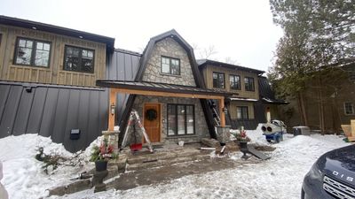 Residential Roofing Installation using 16" Standing Seam Panels