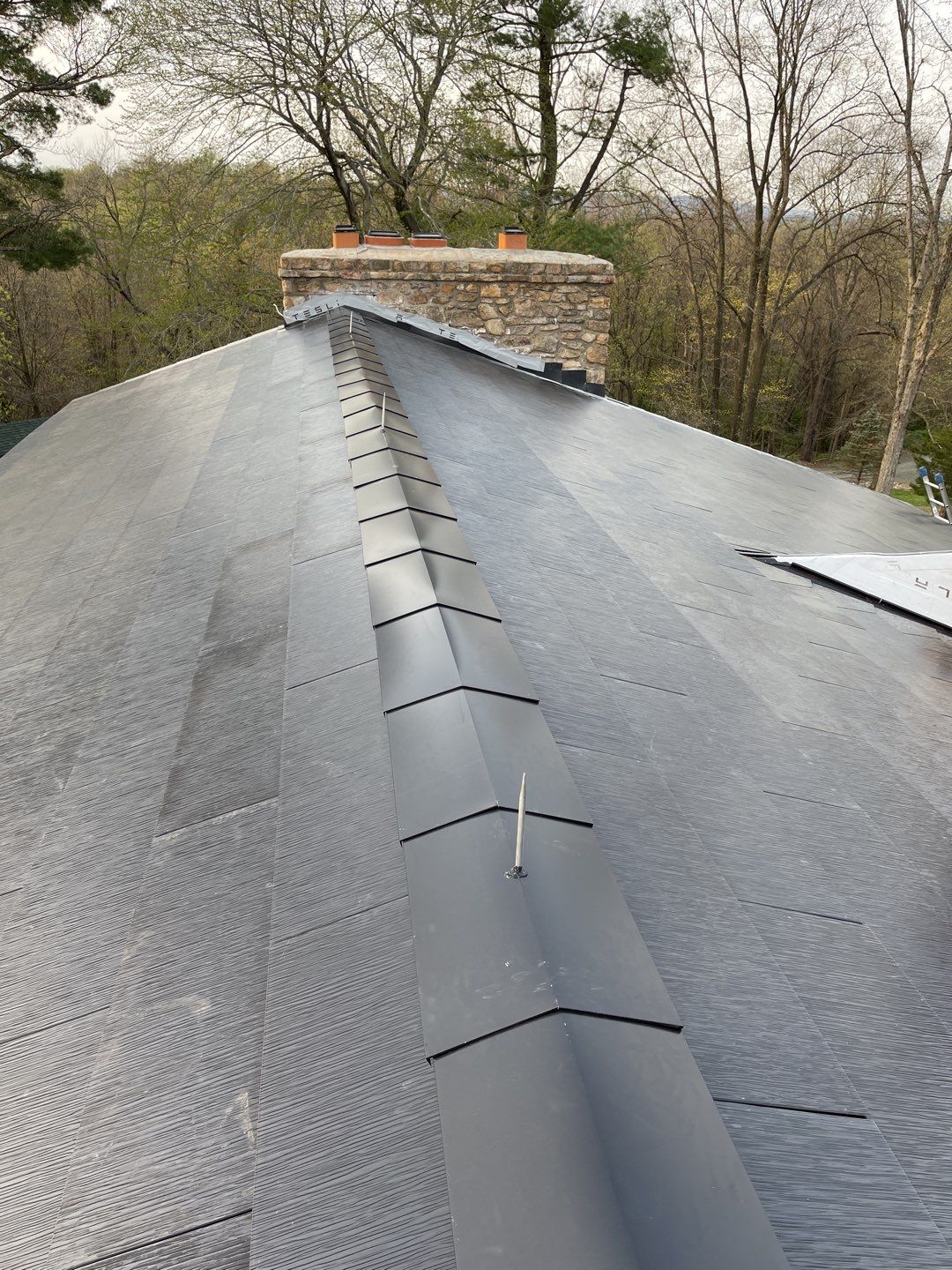 Tesla Solar Roof Replacement by American Home Contractors