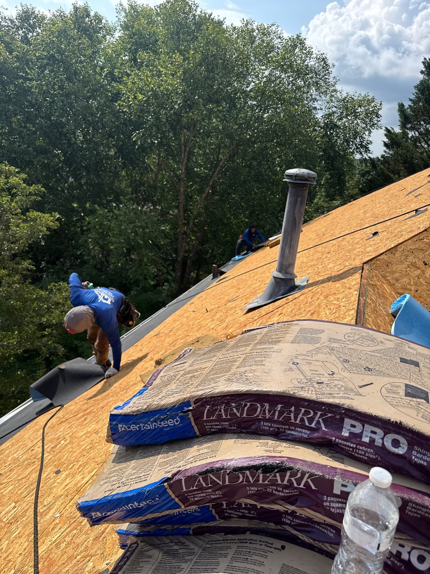 New Shingle Roof & New Gutters and downspouts with covers by Alpha Design Services