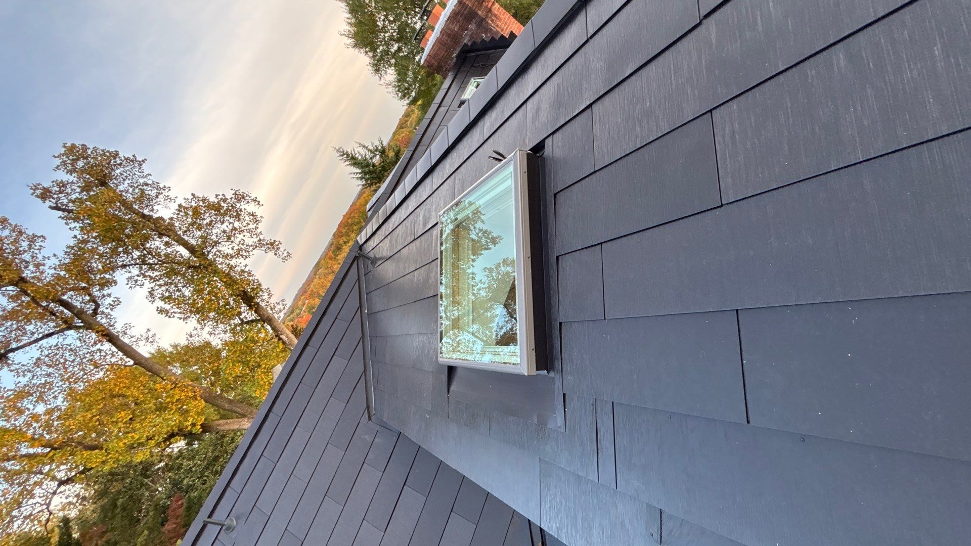Sleek Tesla Solar Roof + Powerwall Installation | Alexandria, VA by American Home Contractors