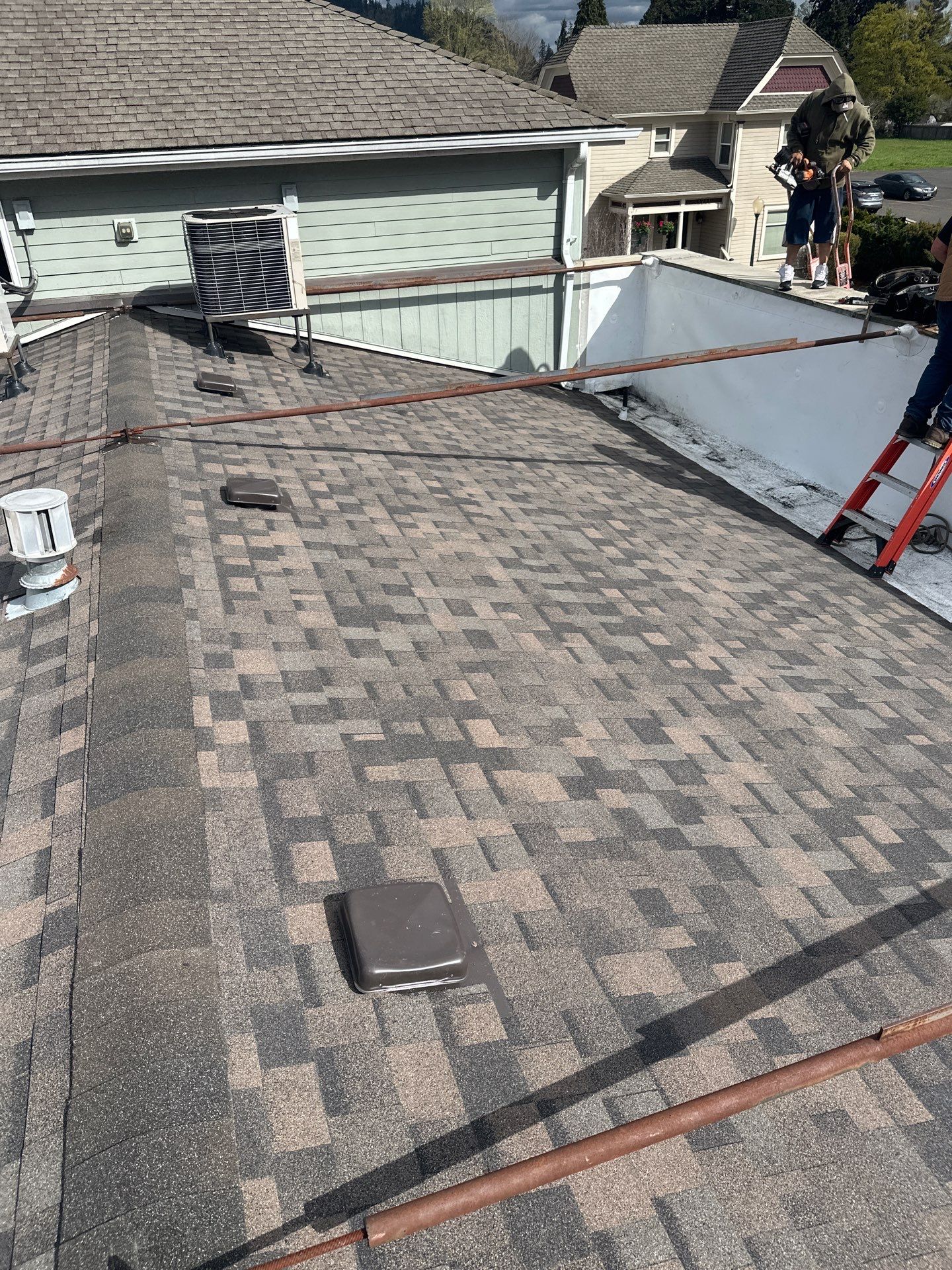 Commercial Roofing Installation using IKO Dynasty & GAF 60Mil TPO by Orezona Building & Roofing Company, Inc.