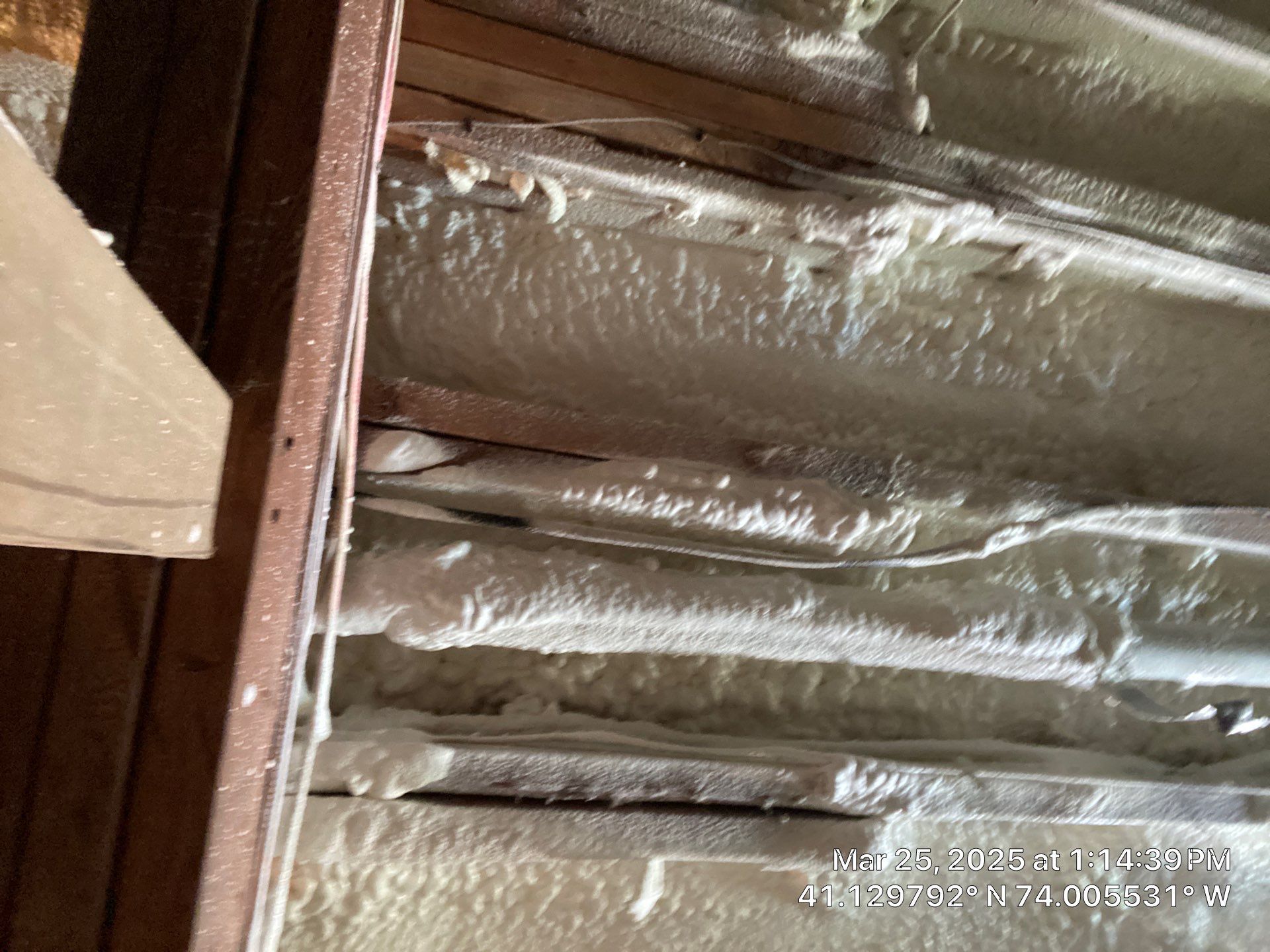 Attic Insulation using open cell spray foam and closed cell rim joist by NYS Foam & Energy