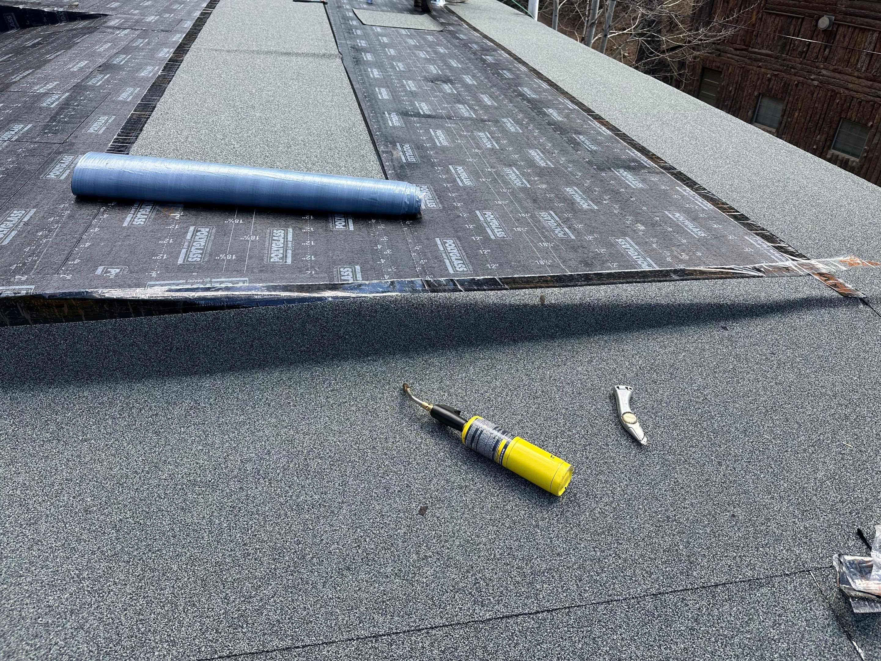 Residential Roofing Installation using Modified Bitumen Roofing by Blue Peaks Roofing LLC 