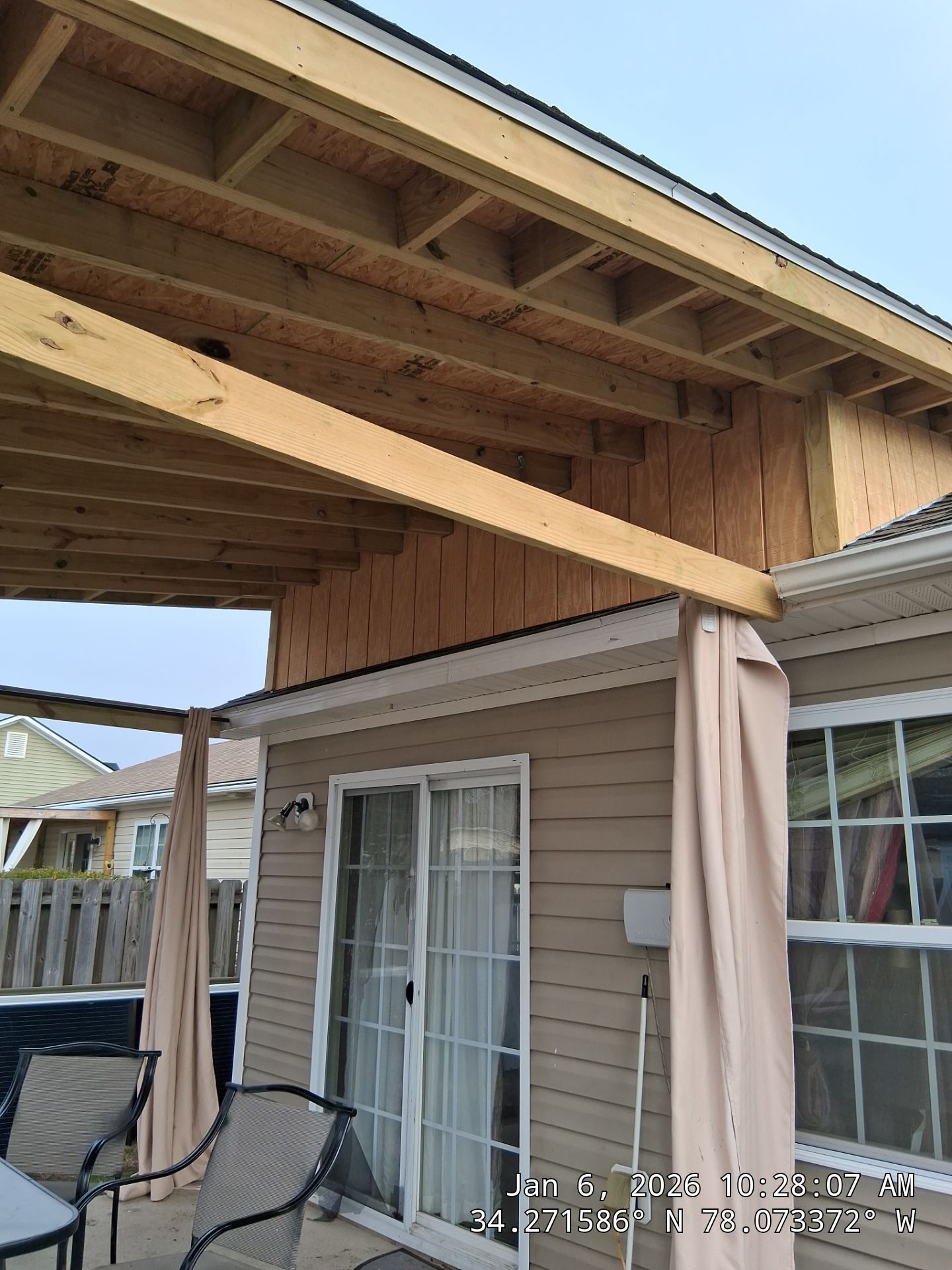 Covered Porch Build and Fortified Roof Replacement with Solar Panels by RGR Construction and Roofing, LLC