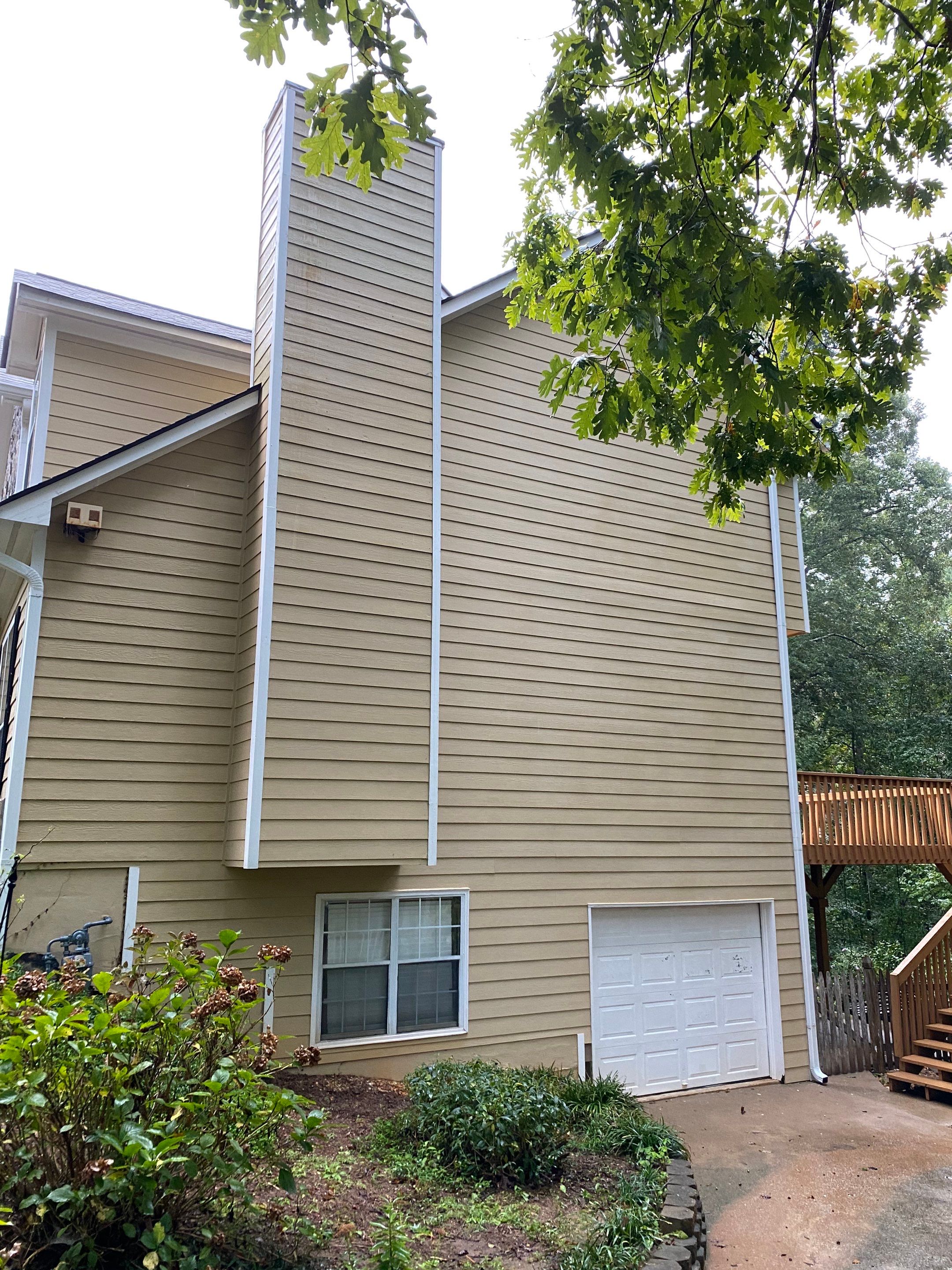 Full Exterior House Painting for Suburban Residence in Douglasville by Swift Home Renovations