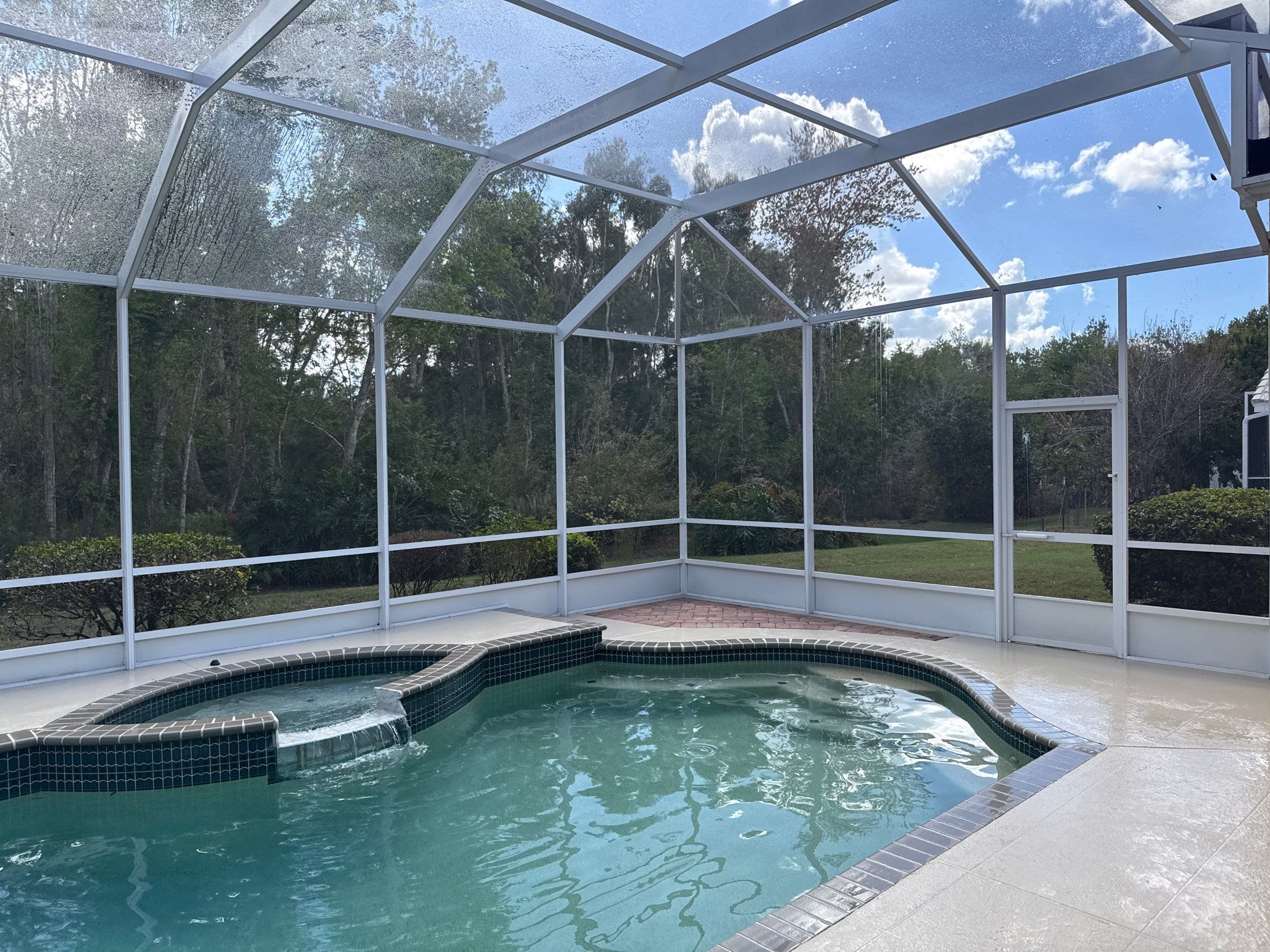 Painted Pool Deck, Pool Cage & Exterior Surface Cleaning in Creekwood – Bradenton, FL by Sunshine AquaWash