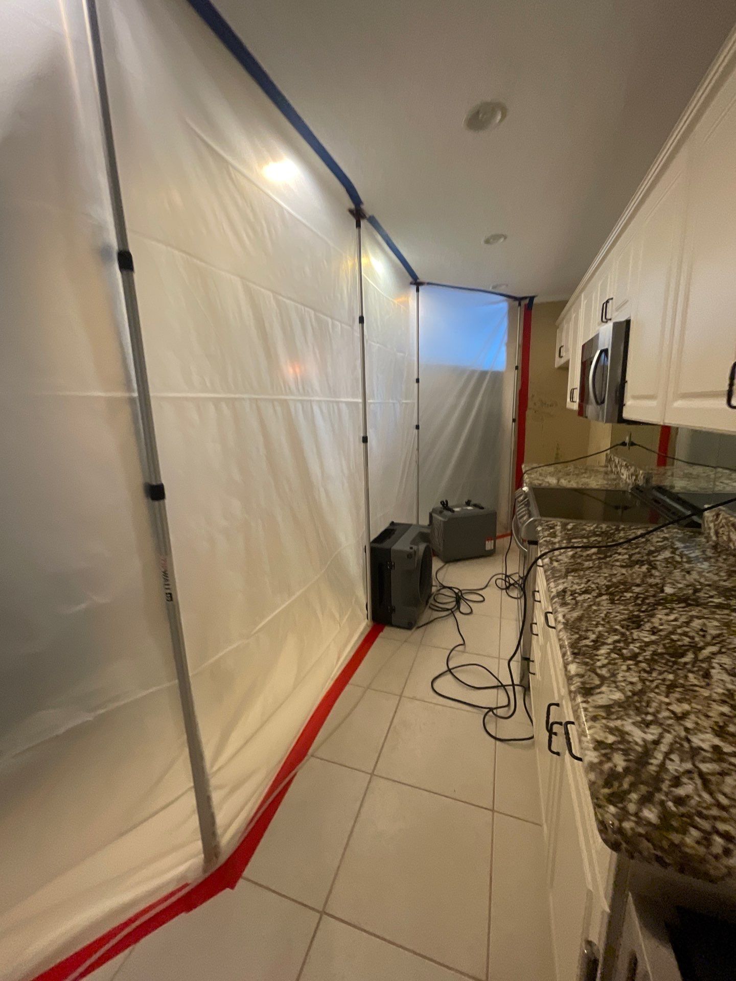 Mold remediation and rebuild of kitchen and living areas by Bay Coast Restoration 