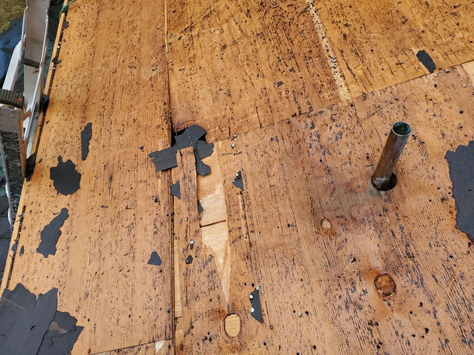 Residential Roofing Installation using Roof Replacement by American Roofing & Construction LLC
