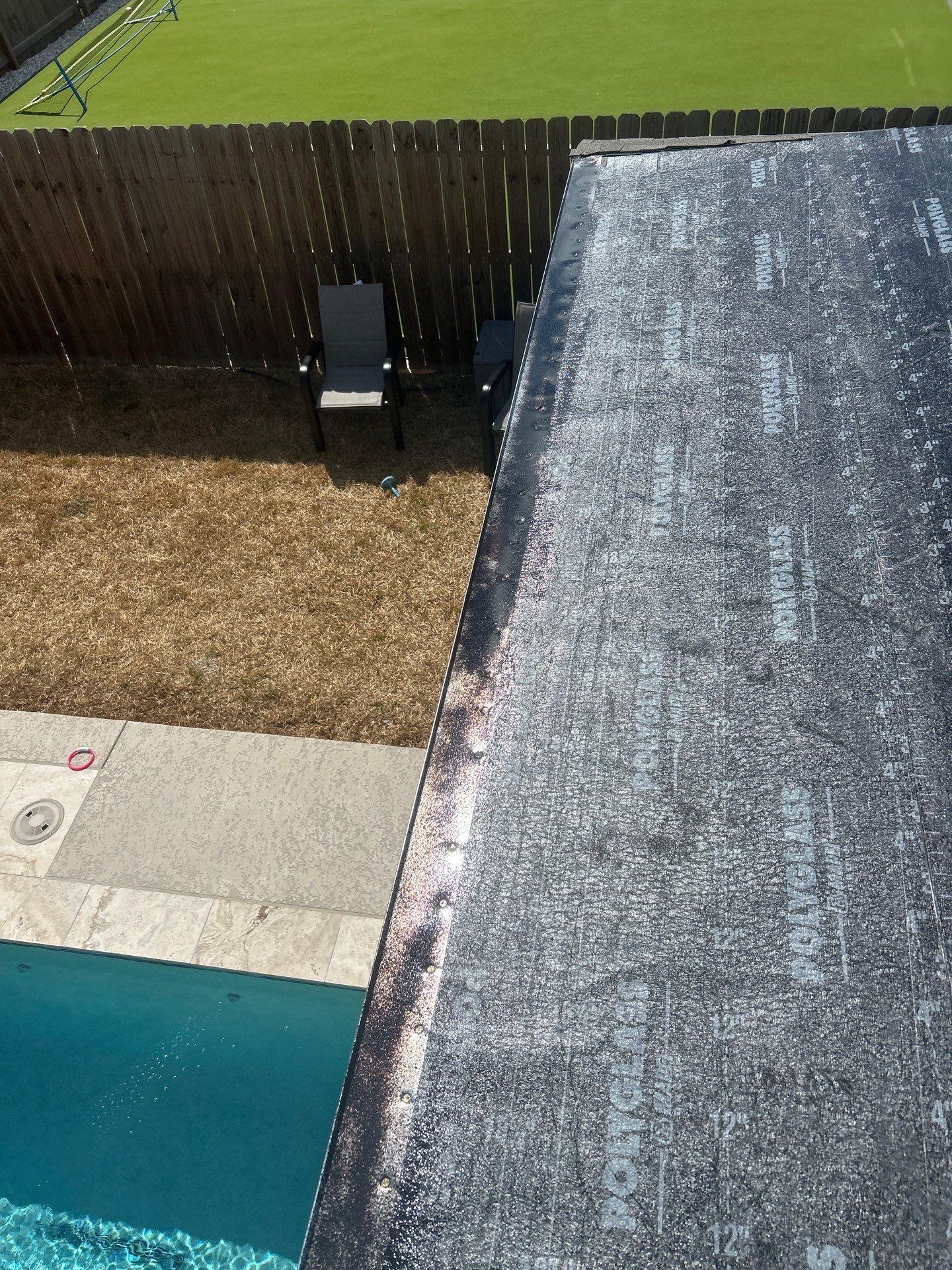 Patio Pool Cover by Bayfront Roofing and Construction