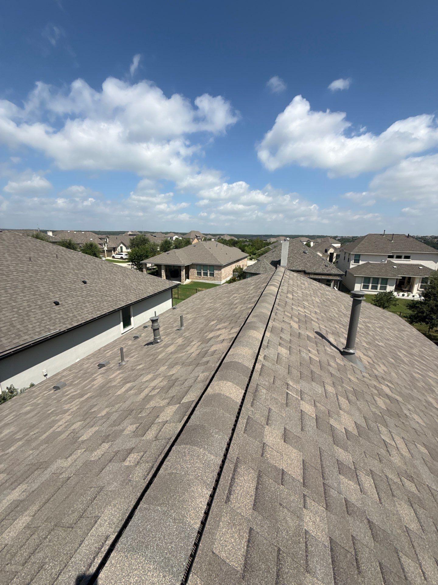 Residential Roof Replacement using Malarkey - Vista AR - Weathered Wood Plus by Action Exteriors Austin
