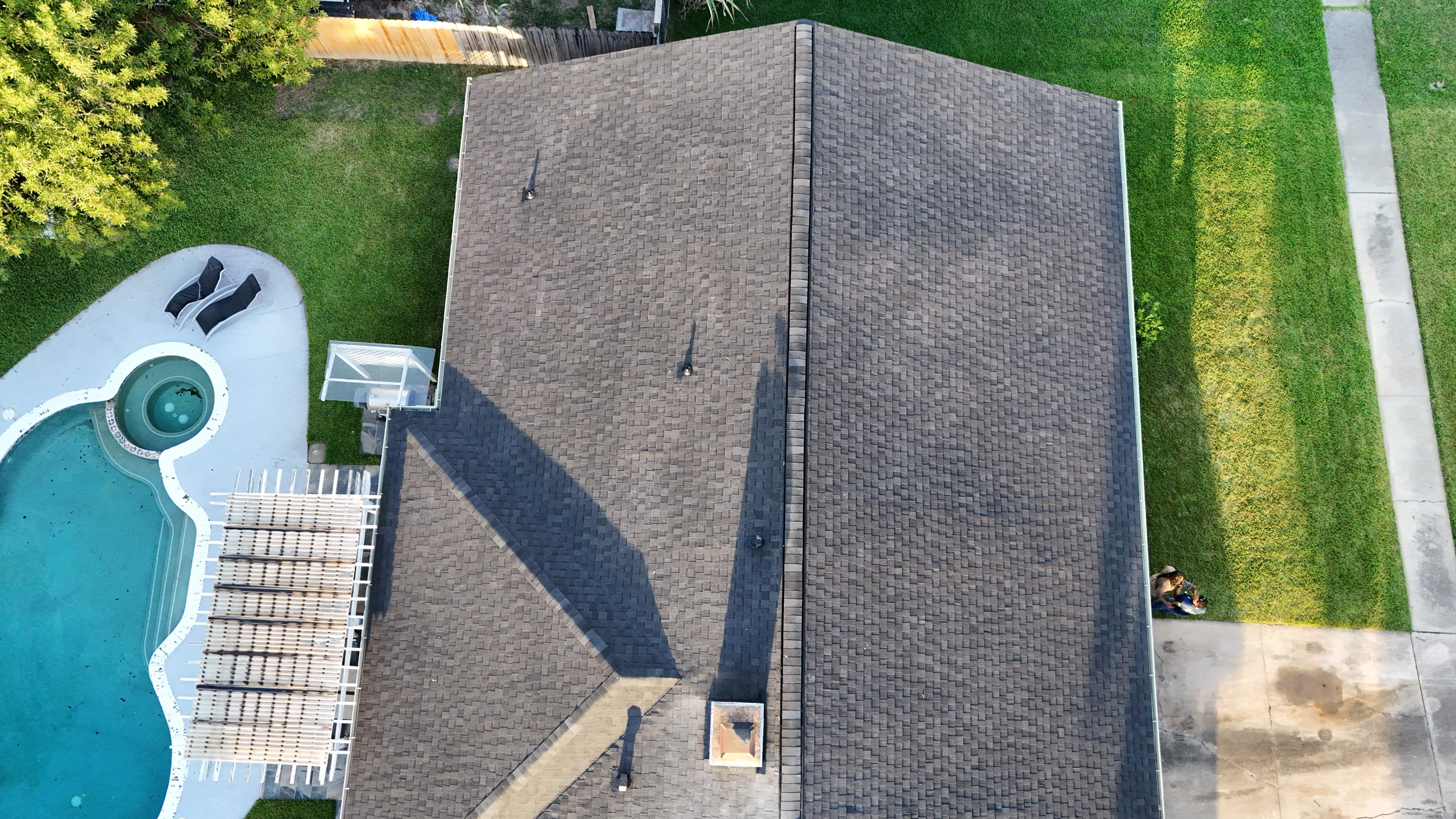 Poolside Roof Replacement in Smoky Gray — Houston, TX by PL Roofing & SB Roofing, LLC.