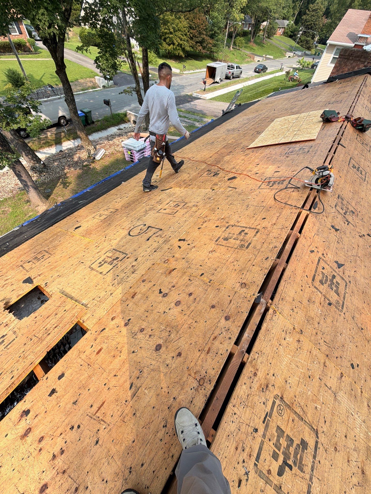 Asphalt Shingle Roof Replacement and Gutter Installation in Richmond by Cade Construction