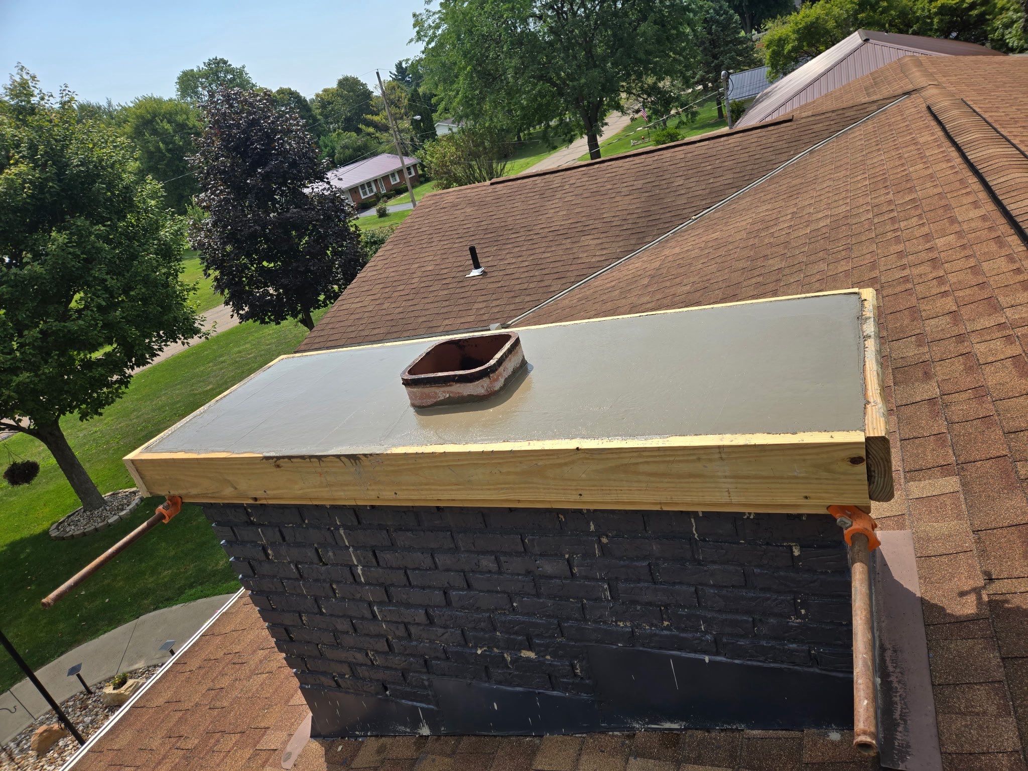 Roof Replacment, Chimney crown by Know-A-Guy Roofing & Exteriors