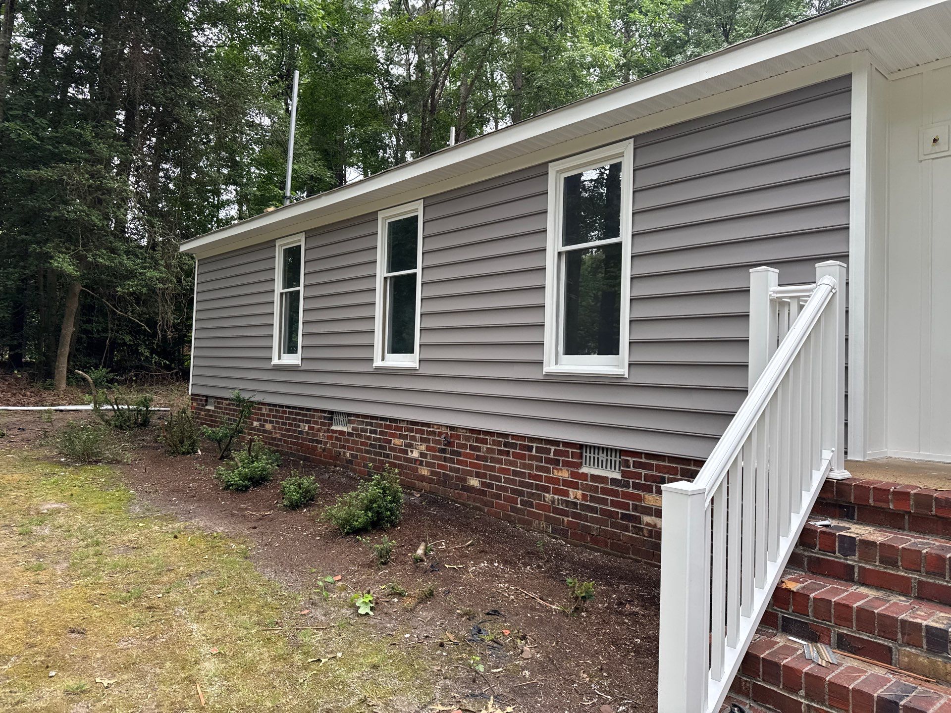 Siding Replacement and Structural Wood Rot Repairs in Mechanicsville by Cade Construction