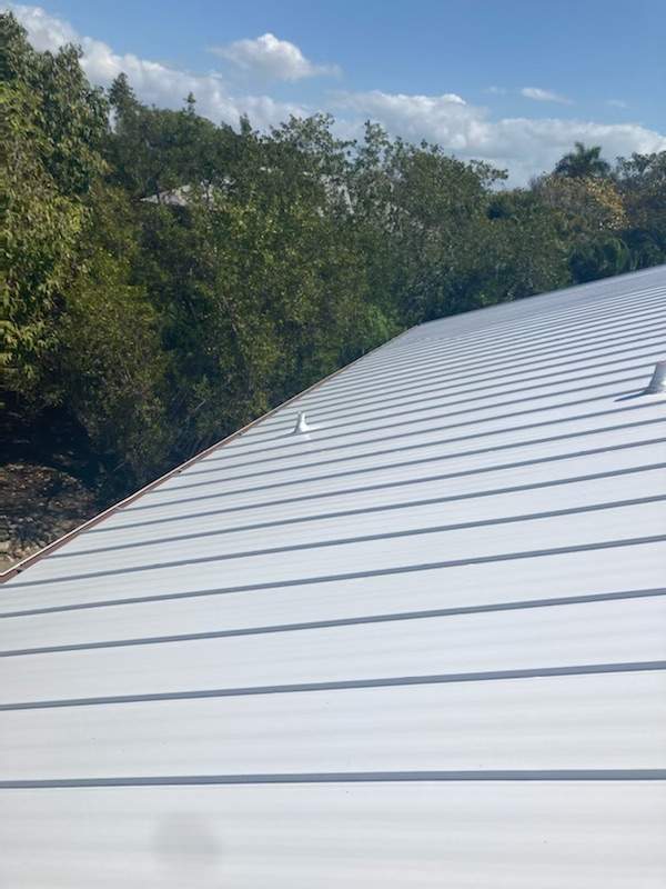 Residential Roofing Installation using Gulf Coast Metals Gulf Seam Panels by Four Peaks Roofing