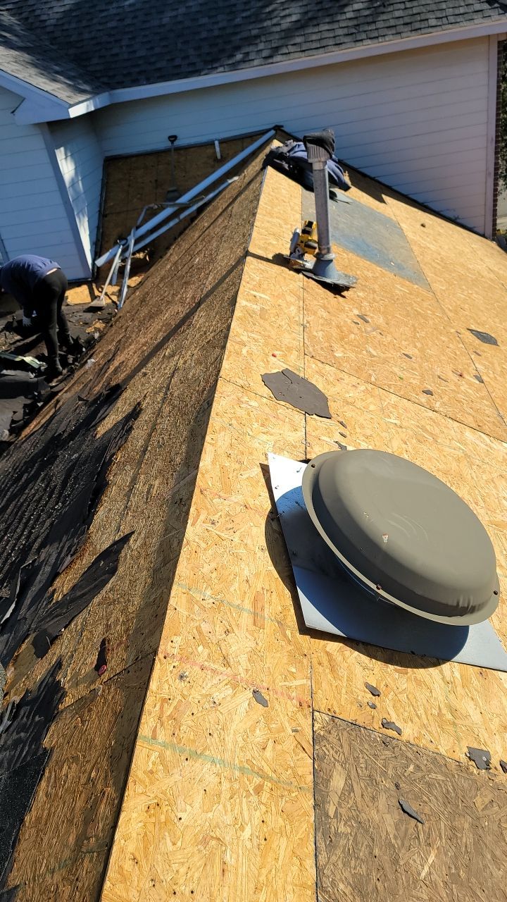 Residential Roofing Installation using Roof Replacement by American Roofing & Construction LLC