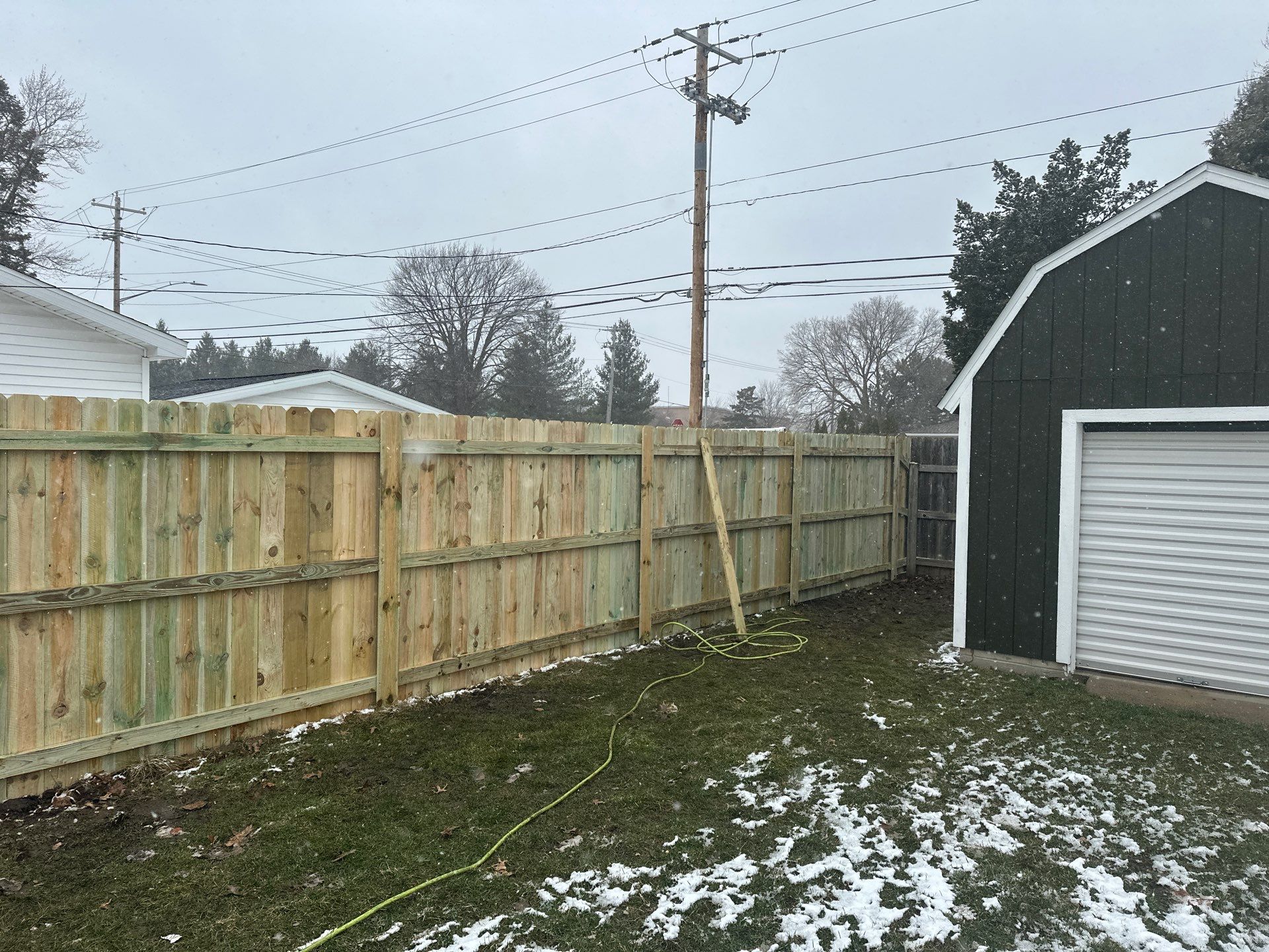 Pressure-Treated Wood Privacy Fence Replacement in Waterloo by Perfect Picket Fence and Stain