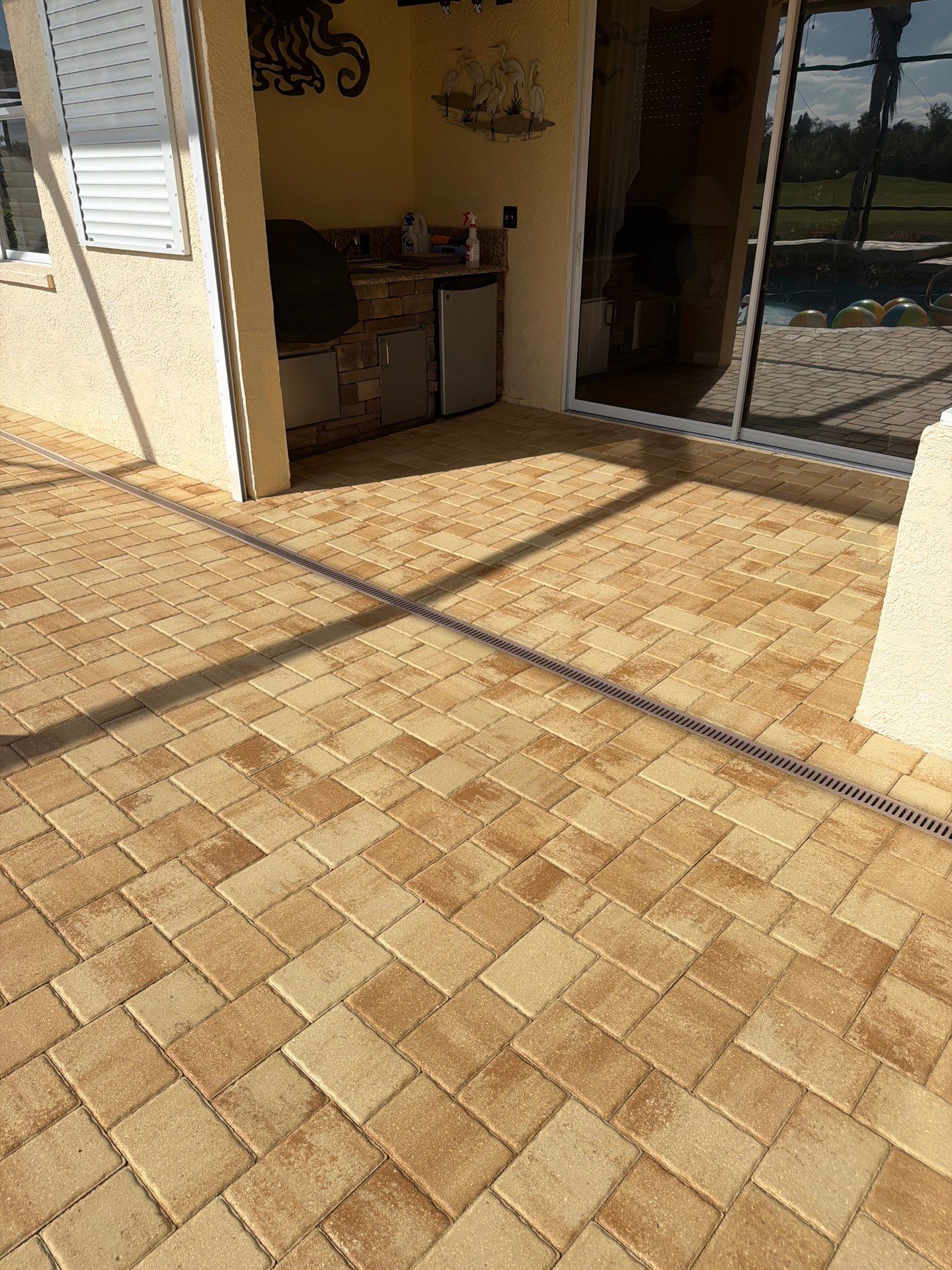 Custom Tan Paver Pool Deck and Patio in Sun City Center by Supreme Paver Experts