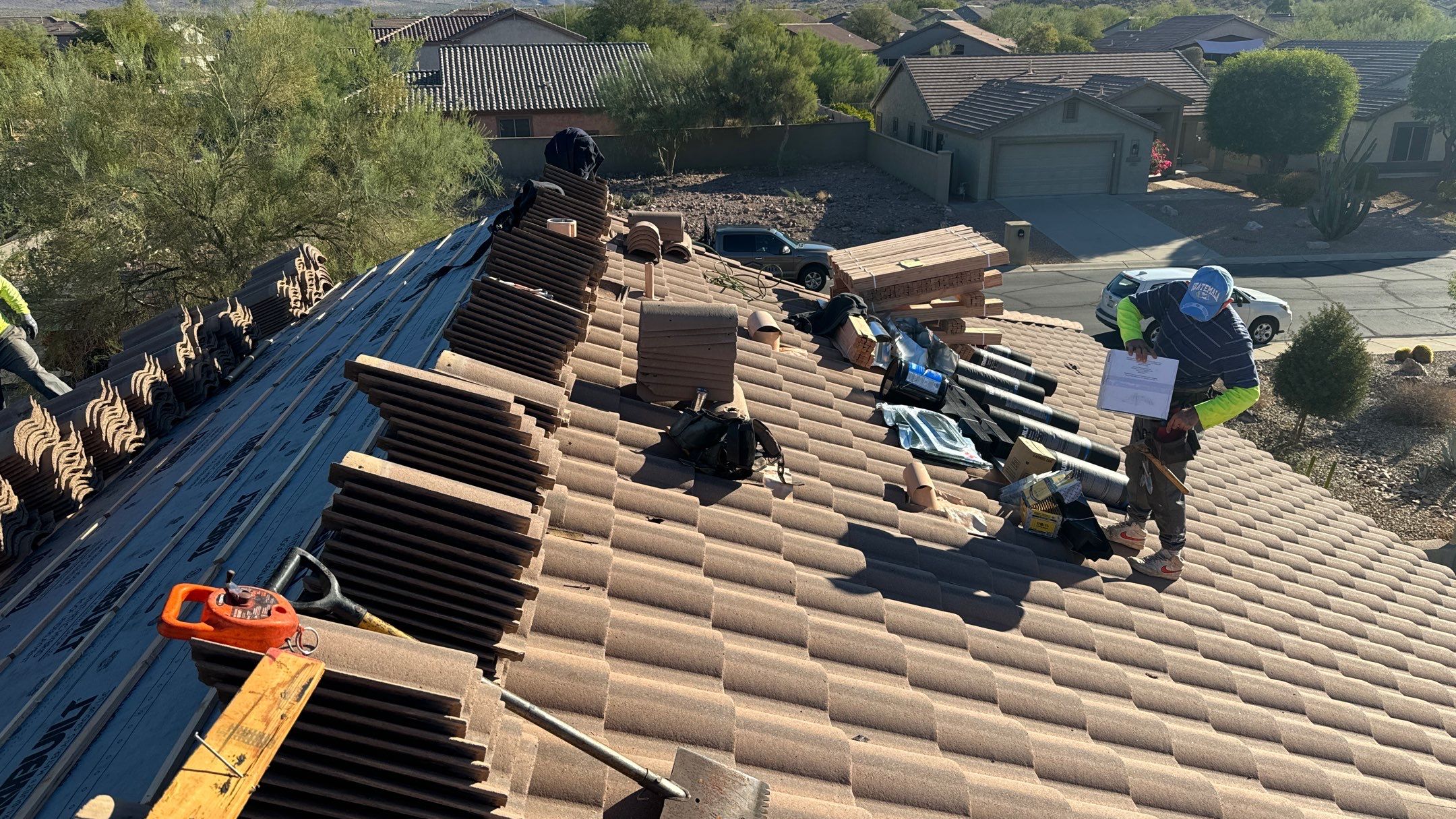 Residential Roofing Installation using Clay Tile by Weather-Tite Exteriors LLC