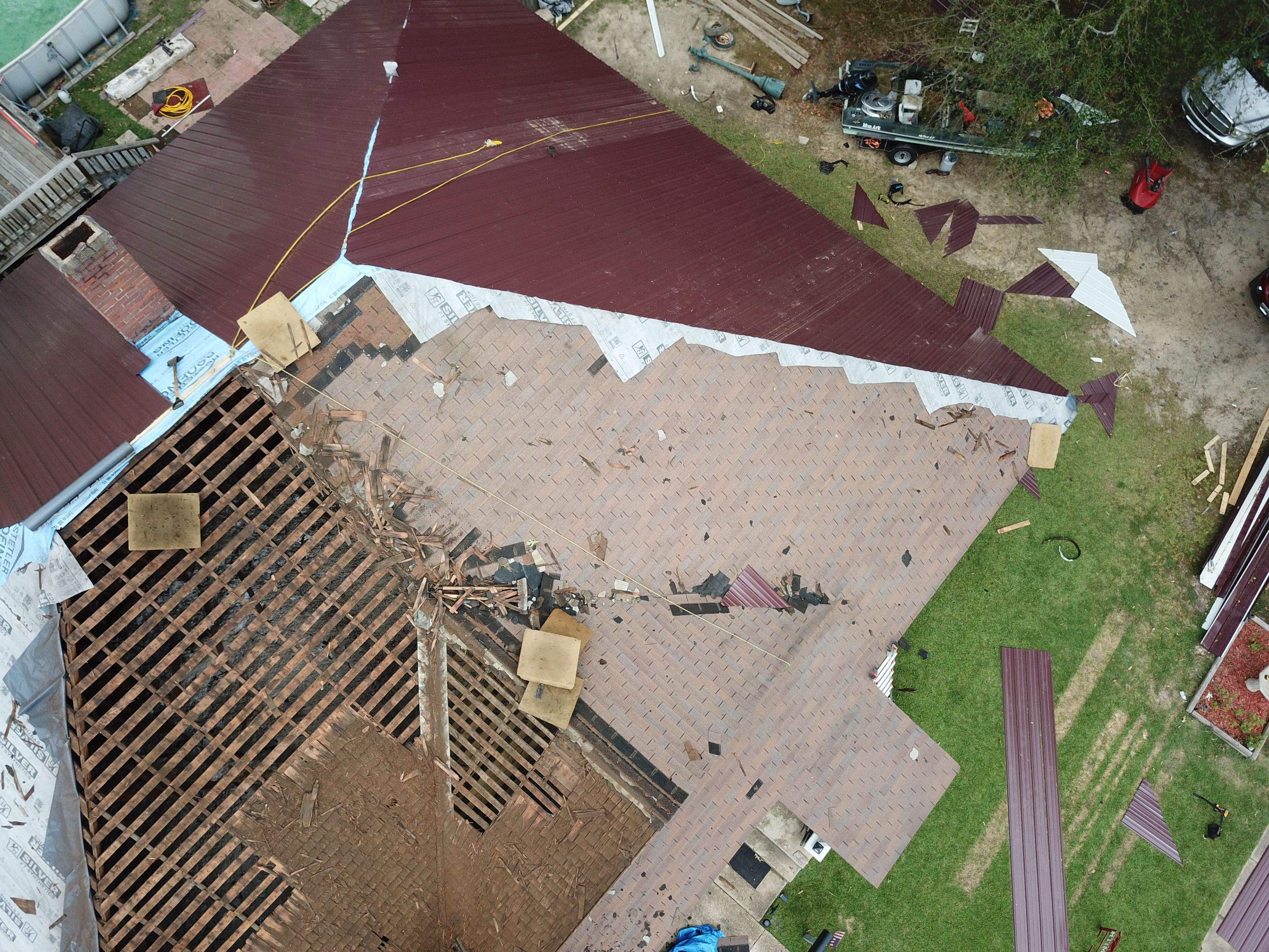 Residential Metal Roof Replacement using Reed's Metals: Colored Residental Panel (Burgundy) by Hostetler Roofing