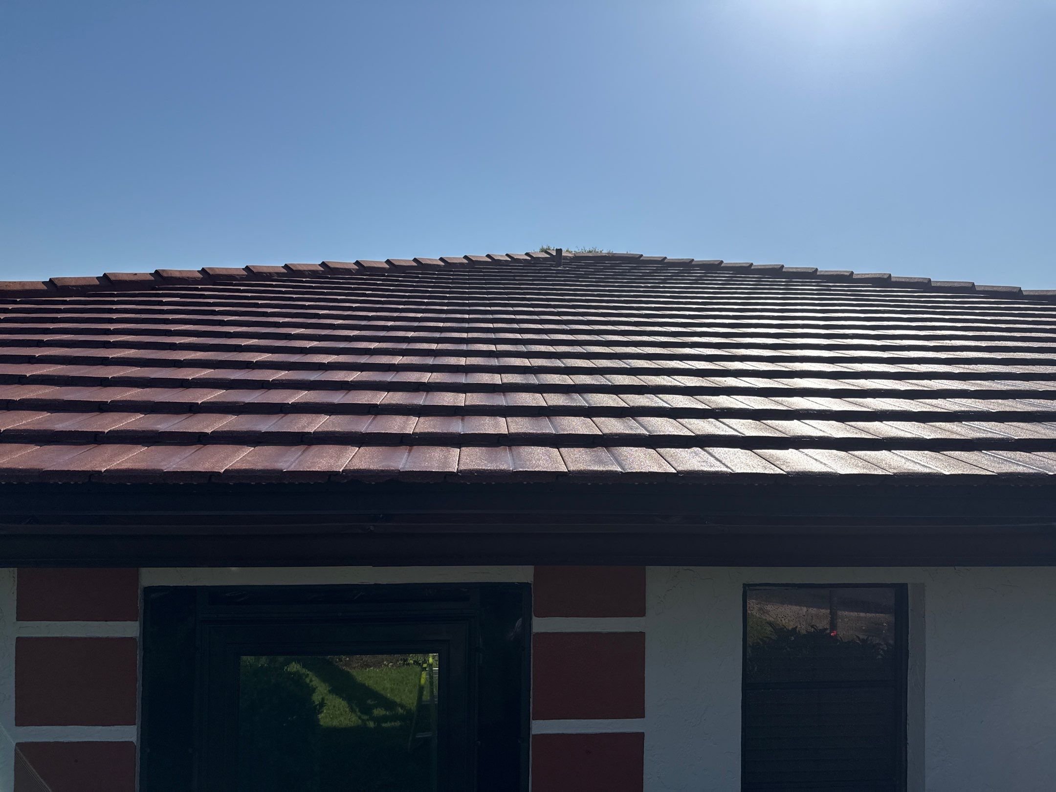 Tile Roof Cleaning – Vivenda at Bradenton I (5-Star Review & Plant Protection) by Sunshine AquaWash
