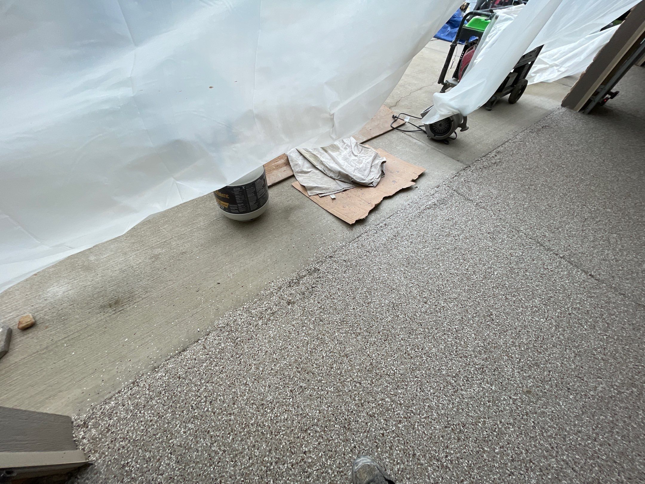 Garage Transformation using Pebble Beach and Front Porch using Greystone by Croc Coatings, LLC