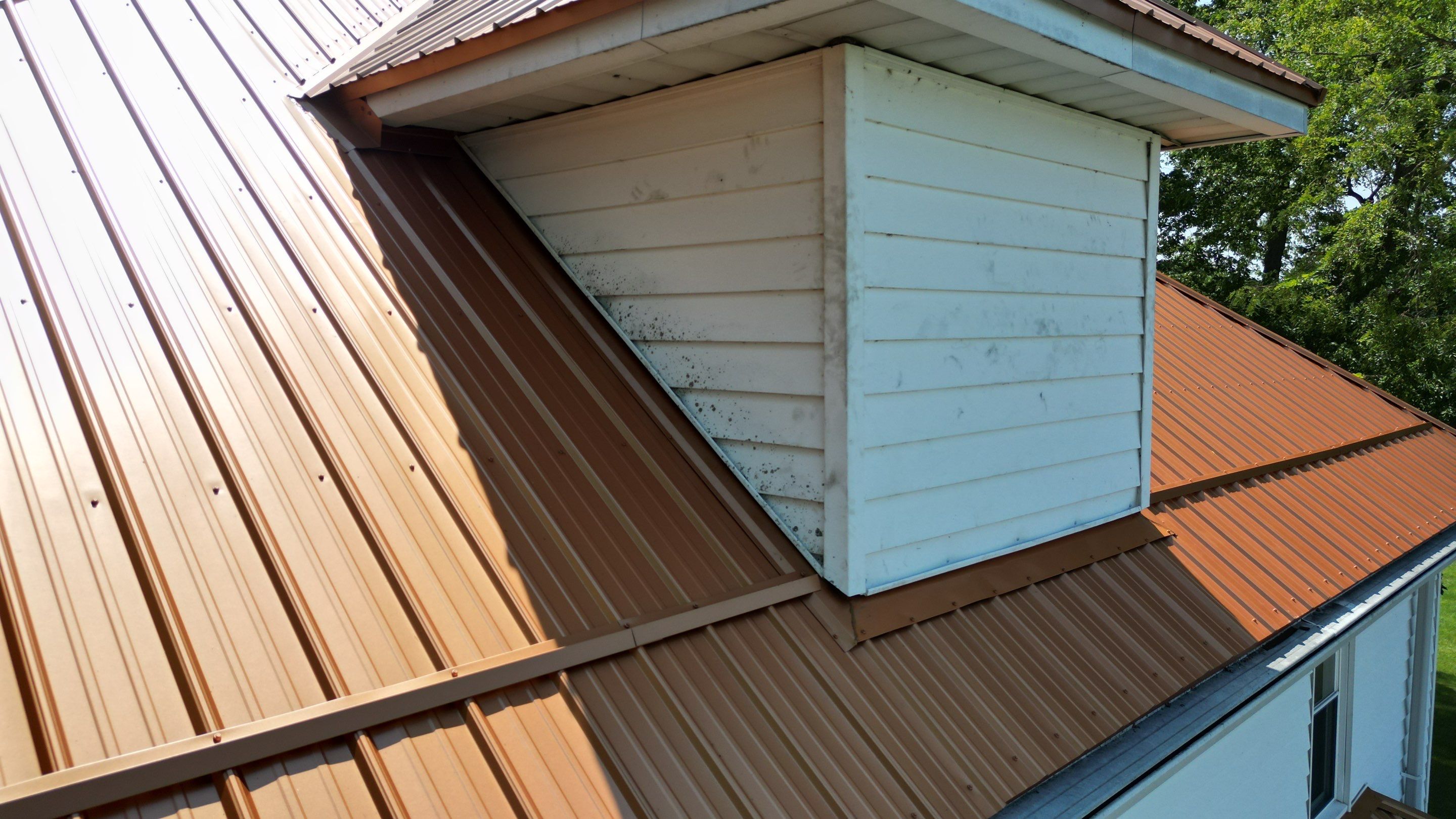 Residential Roofing Installation using Performance Panel Metal - Copper Metallic by RoofX 