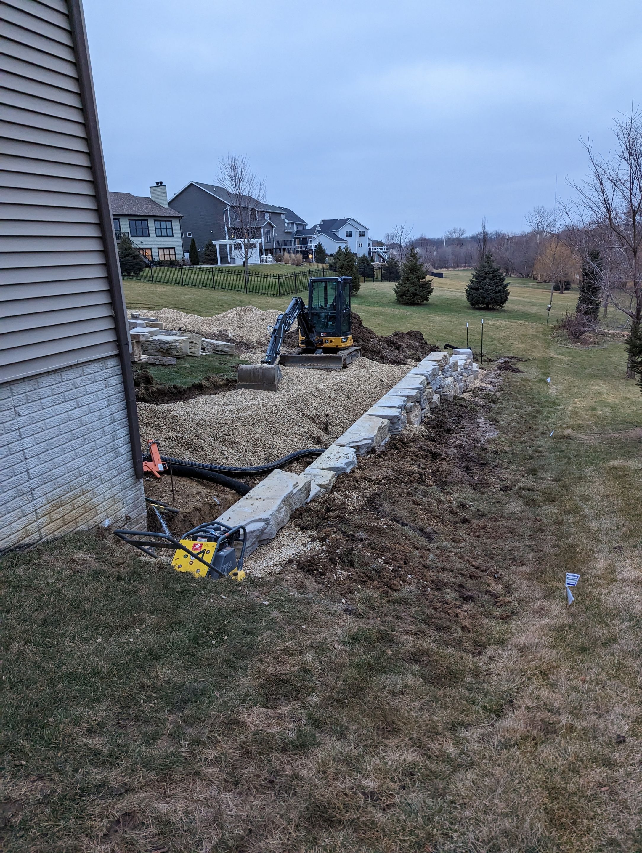 Retaining wall using Rosetta stone by ACE Waterproofing & Basement Solutions