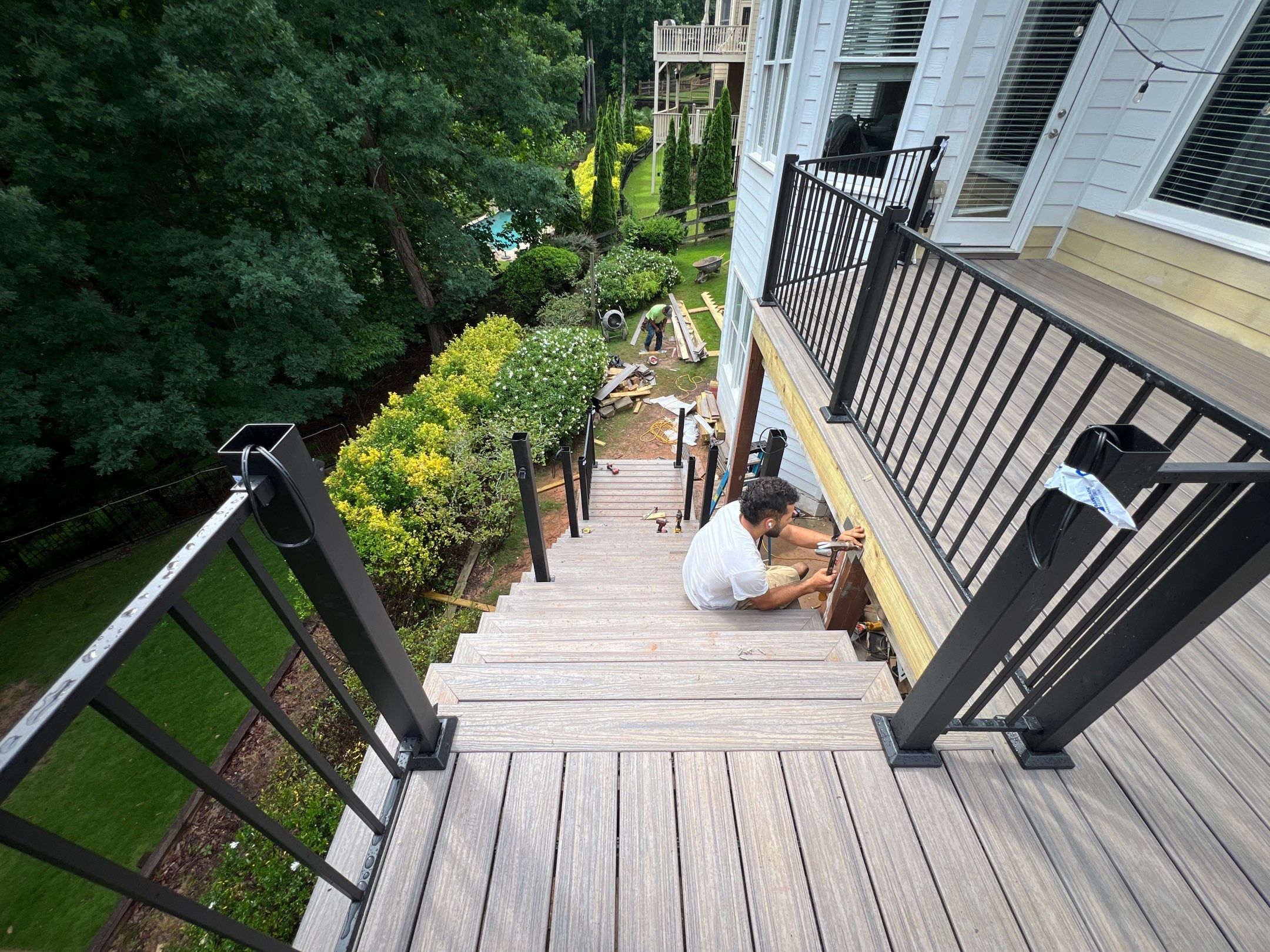 Elevated Composite Deck and Concrete Landing Installation in Kennesaw by Swift Home Renovations
