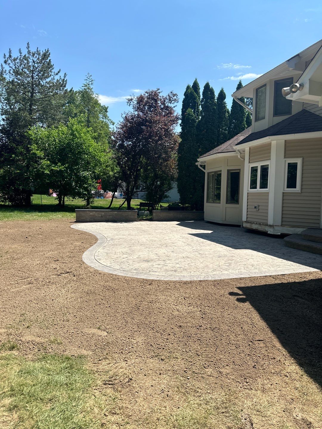 Heavy stone stamped concrete patio and sidewalk  by NG Masonry & Construction LLC