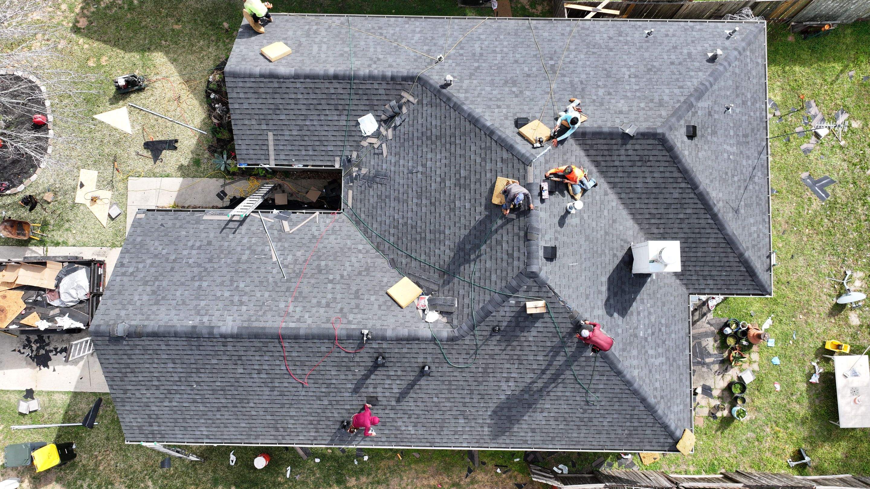 Full Roof Replacement on Brick Two-Story — Conroe, TX by PL Roofing & SB Roofing, LLC.