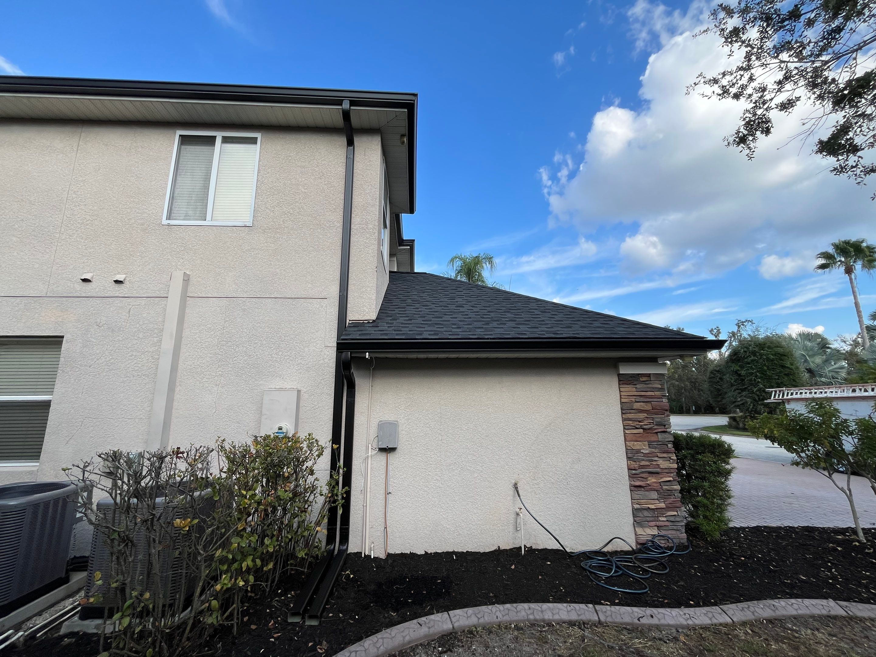 Black 6-inch Seamless Gutters for Modern Ellenton Homes FL by Gutter Professors