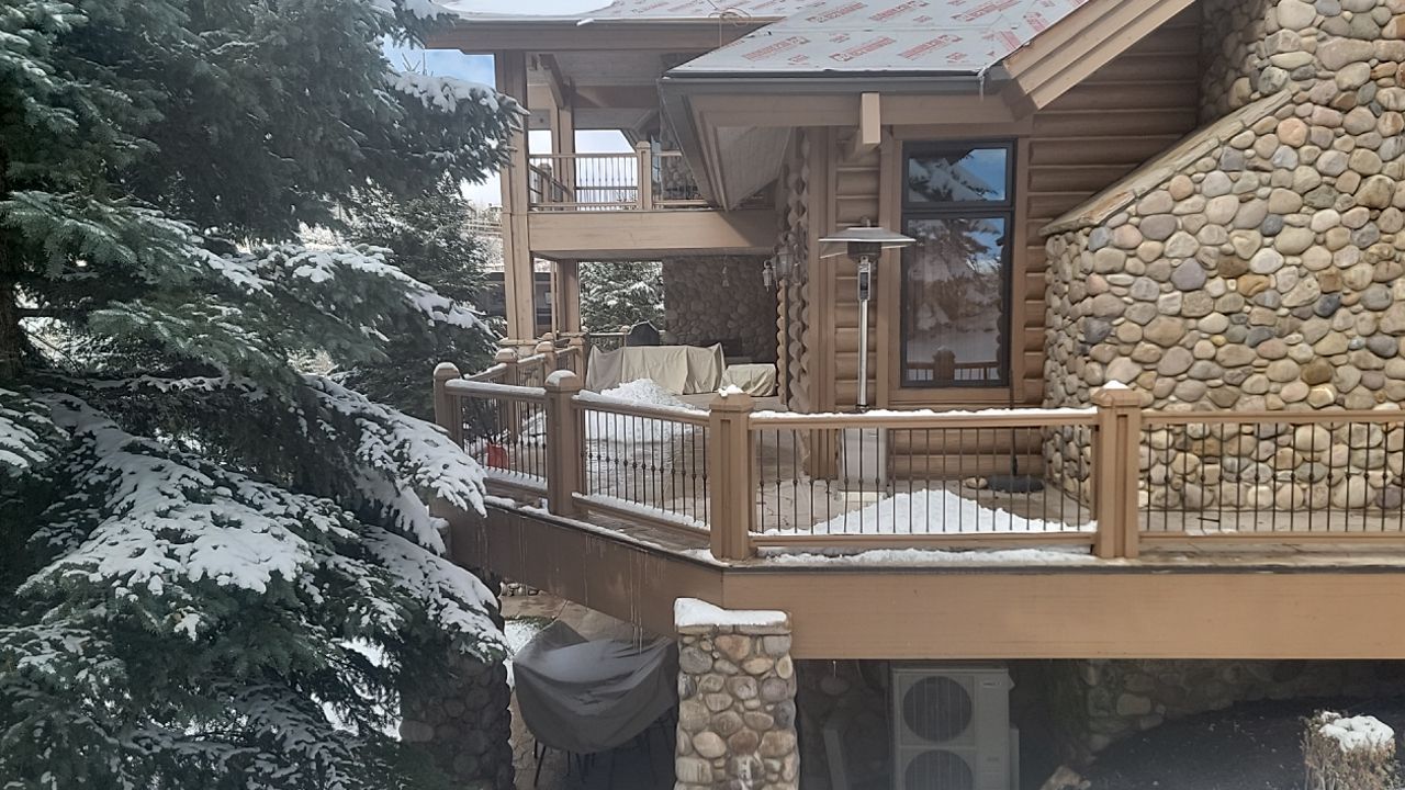 Standing Seam Metal Roof Replacement After Snow Damage by ASAP Roofing & Restoration