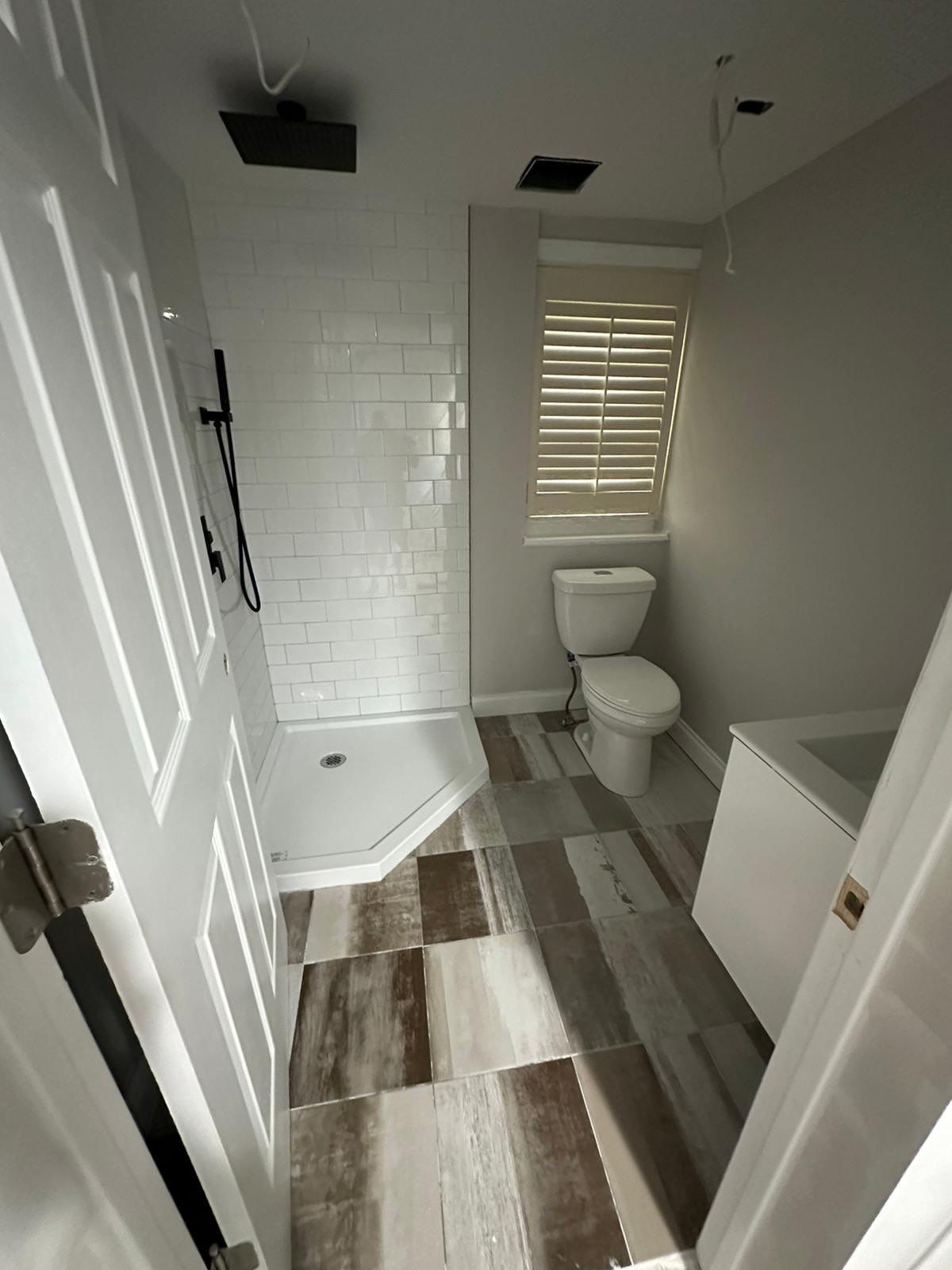 Bathroom Remodel using Cabinets by Home Concepts Construction
