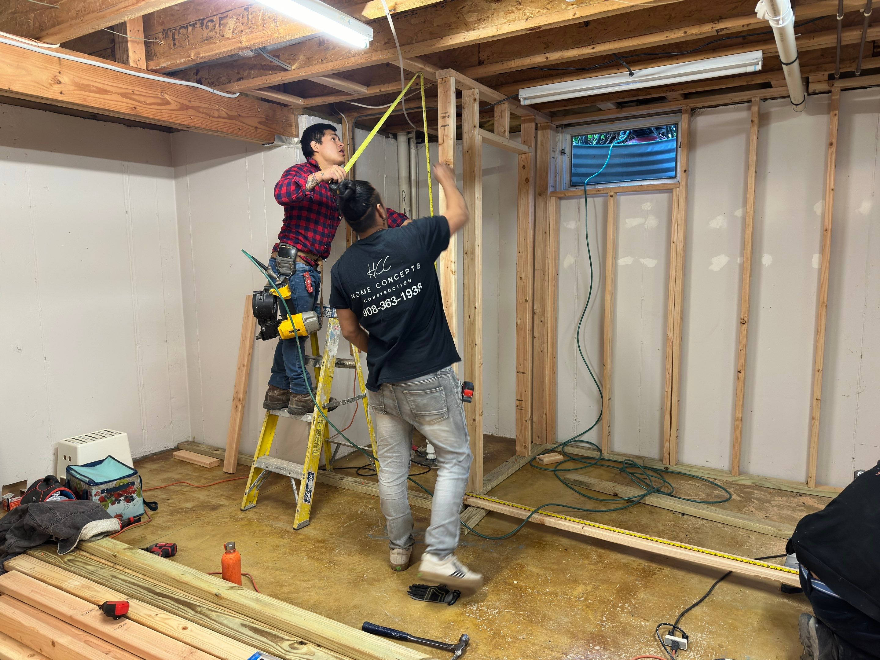 Basement Remodel using Wood by Home Concepts Construction