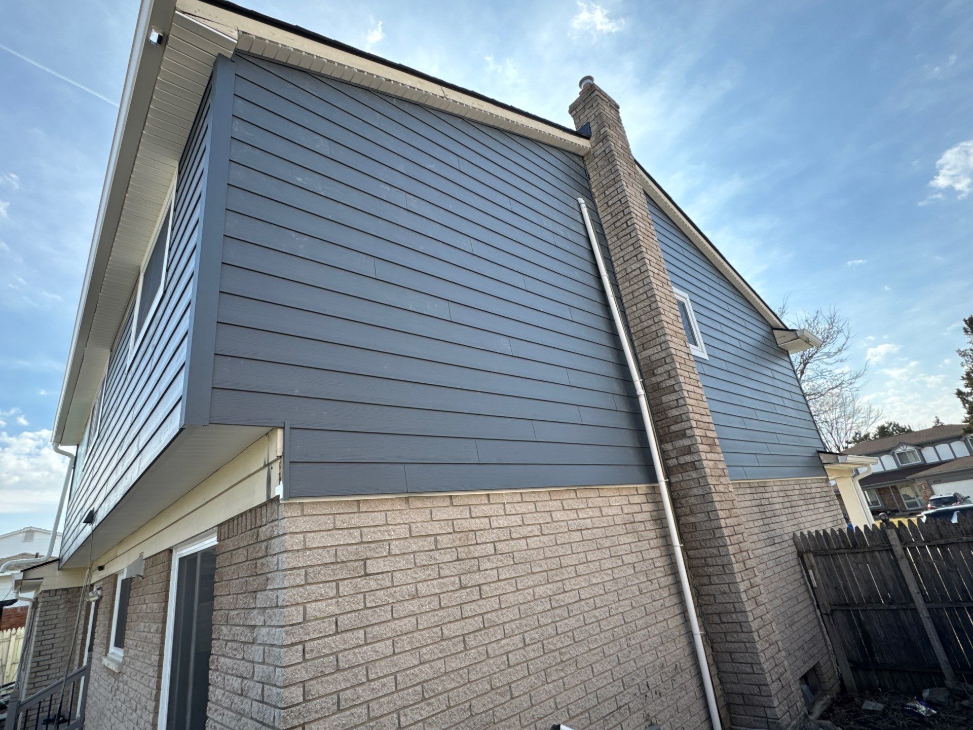 Siding Replacement using Alside Midnight Blue by 180 Contractors