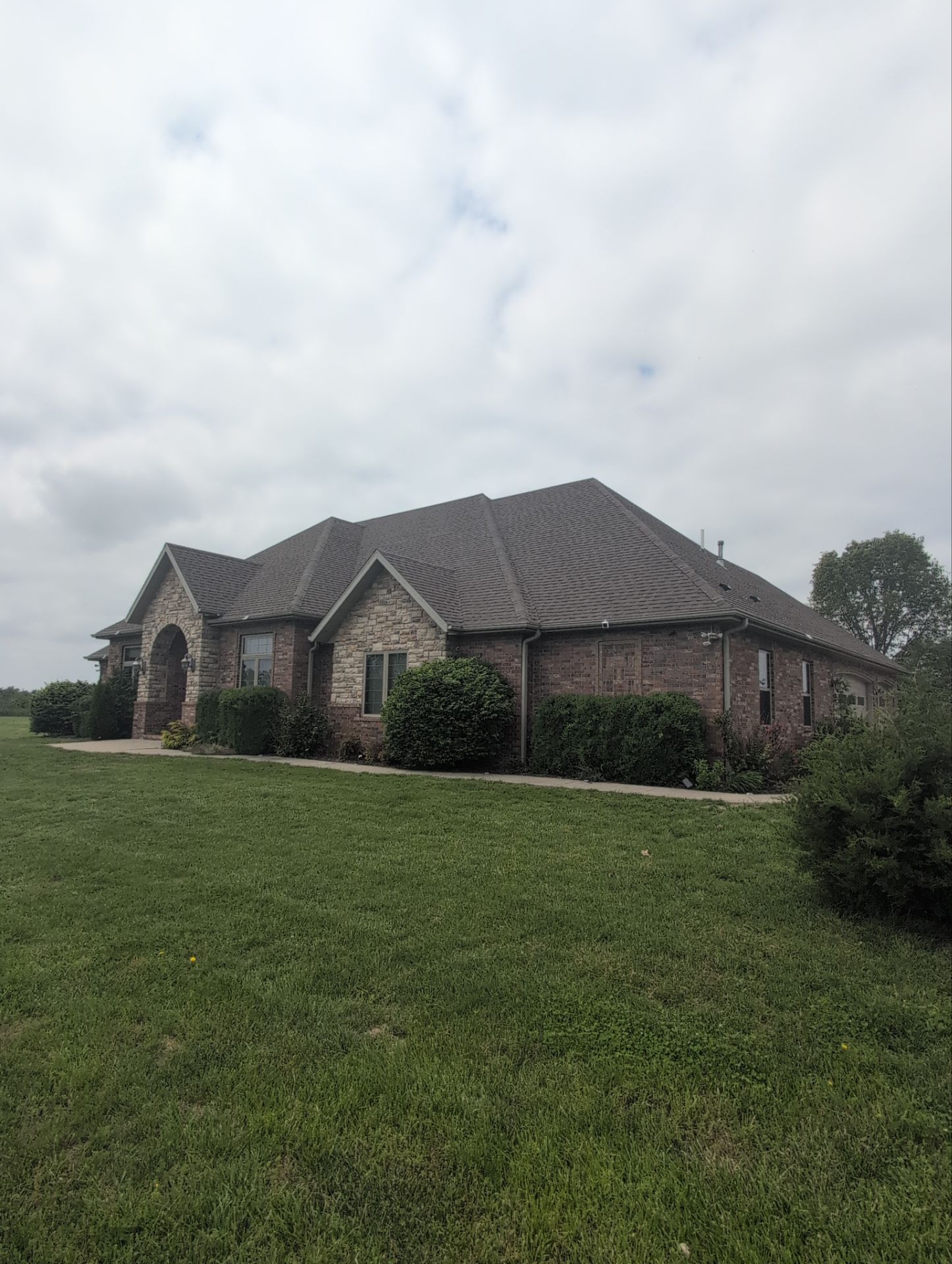 Roof Replacement & Seamless Gutters in Ozark by Table Rock Design + Build
