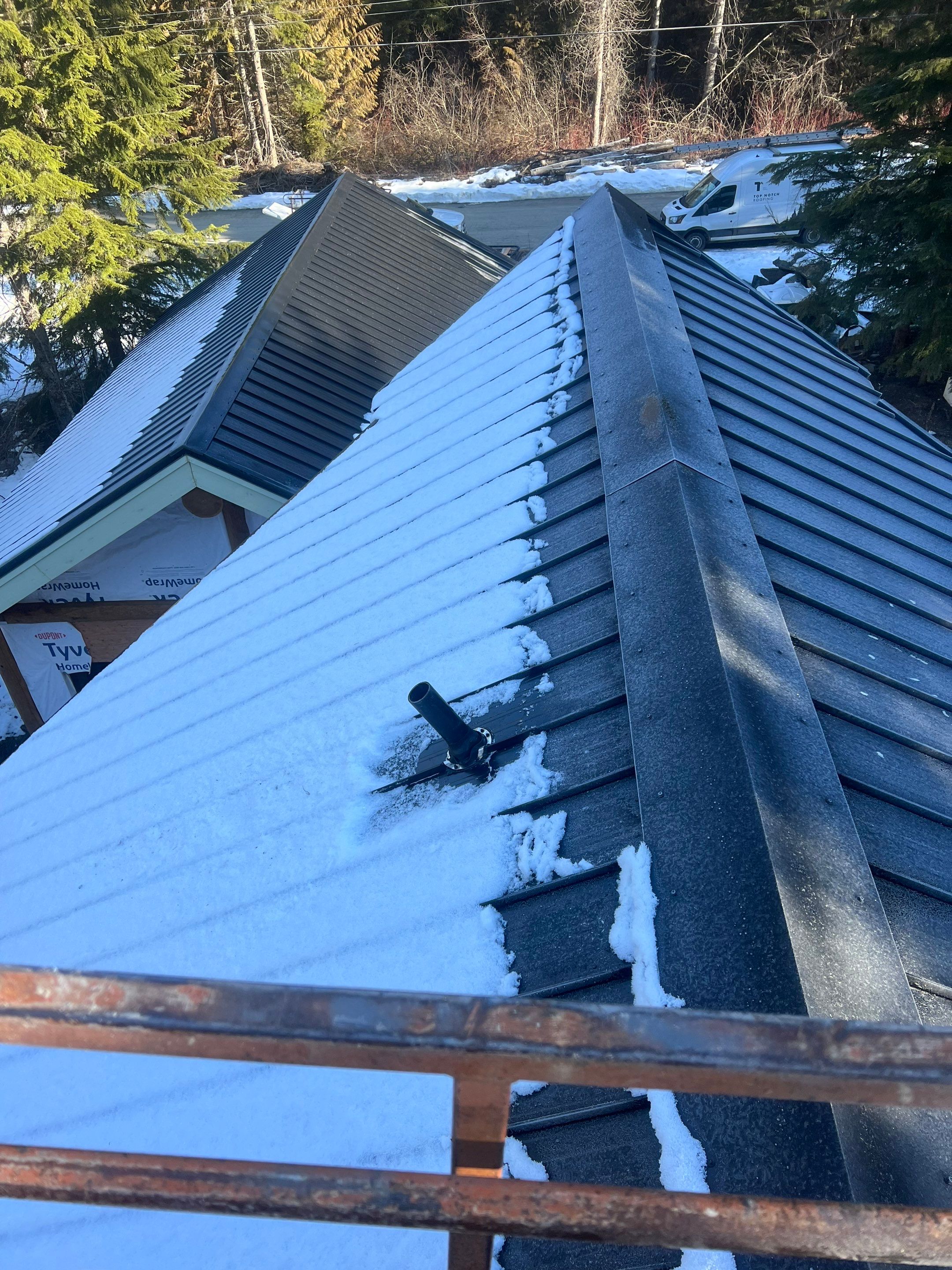 Residential Roofing Installation using 12" Prolok metal  by Top Notch Roofing Inc