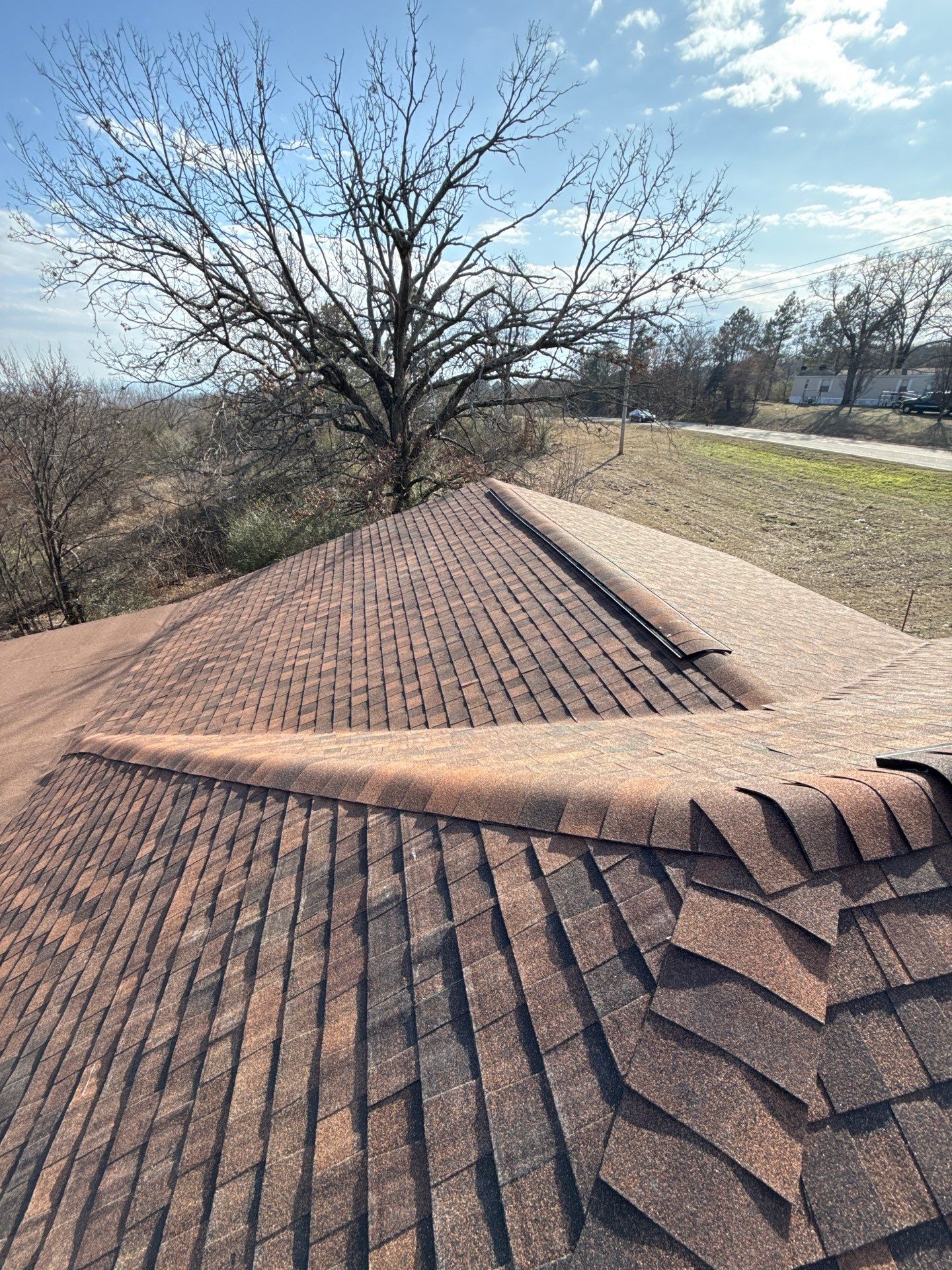 Rustic Hickory Shingles & SBS Cap & Base by In & Out Construction & Remodeling, LLC