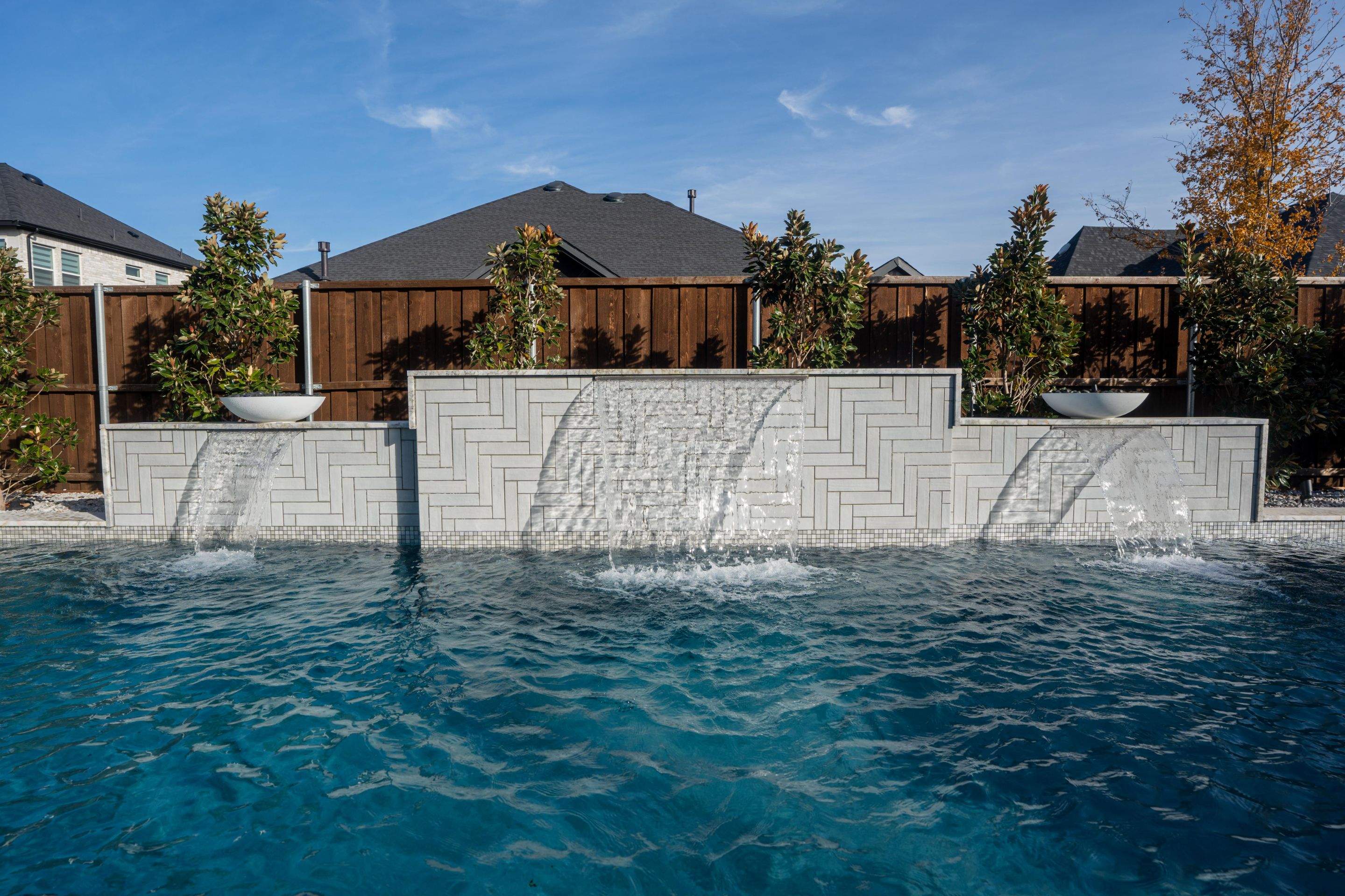 Pool with Large Sun Shelf and Spa by Pinnacle Pools and Spas - DFW