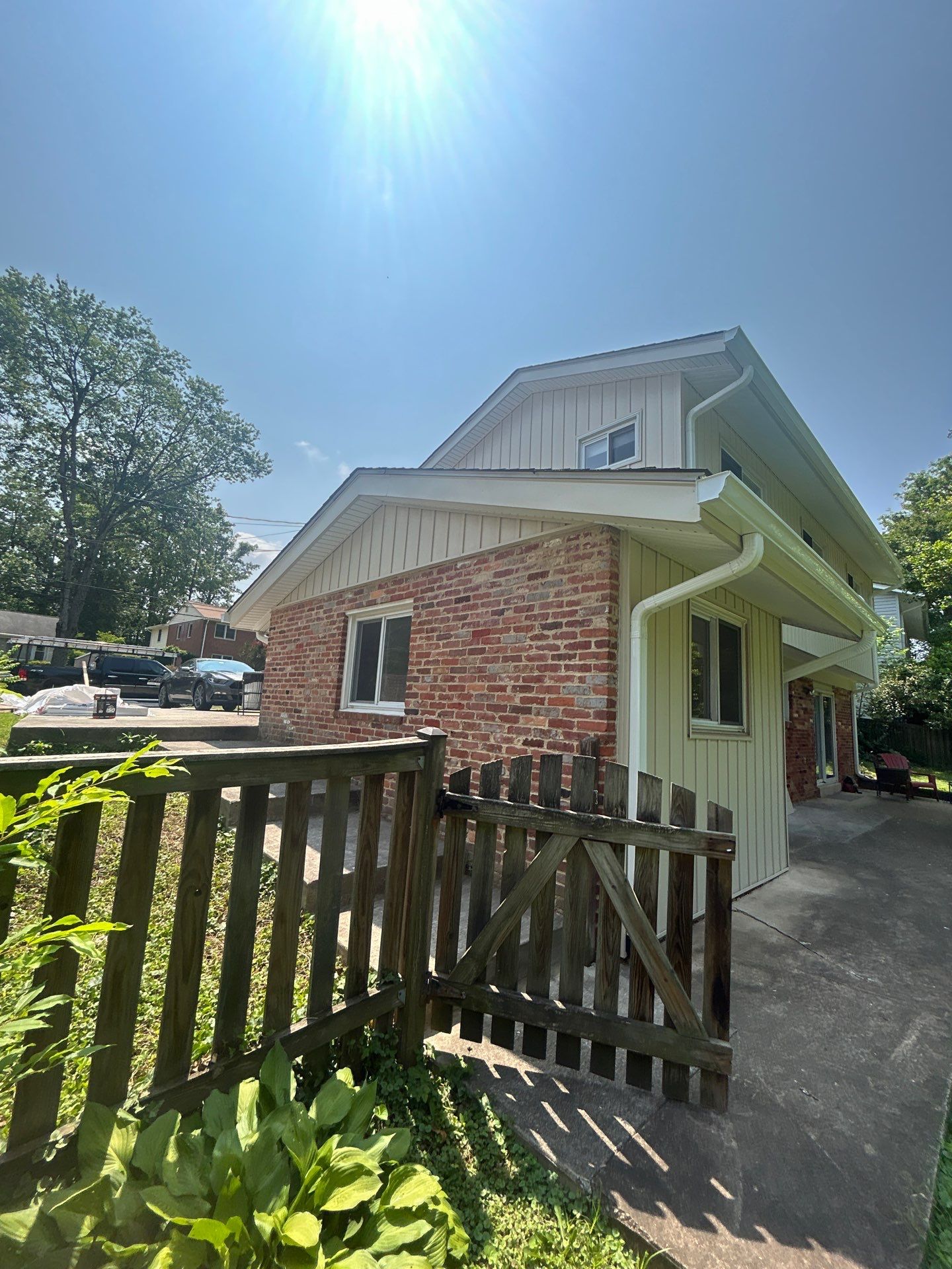 Fairfax: Residential Siding Replacement with CertainTeed 8" Board and Batten Siding in Desert Tan by RM Banning, Inc.