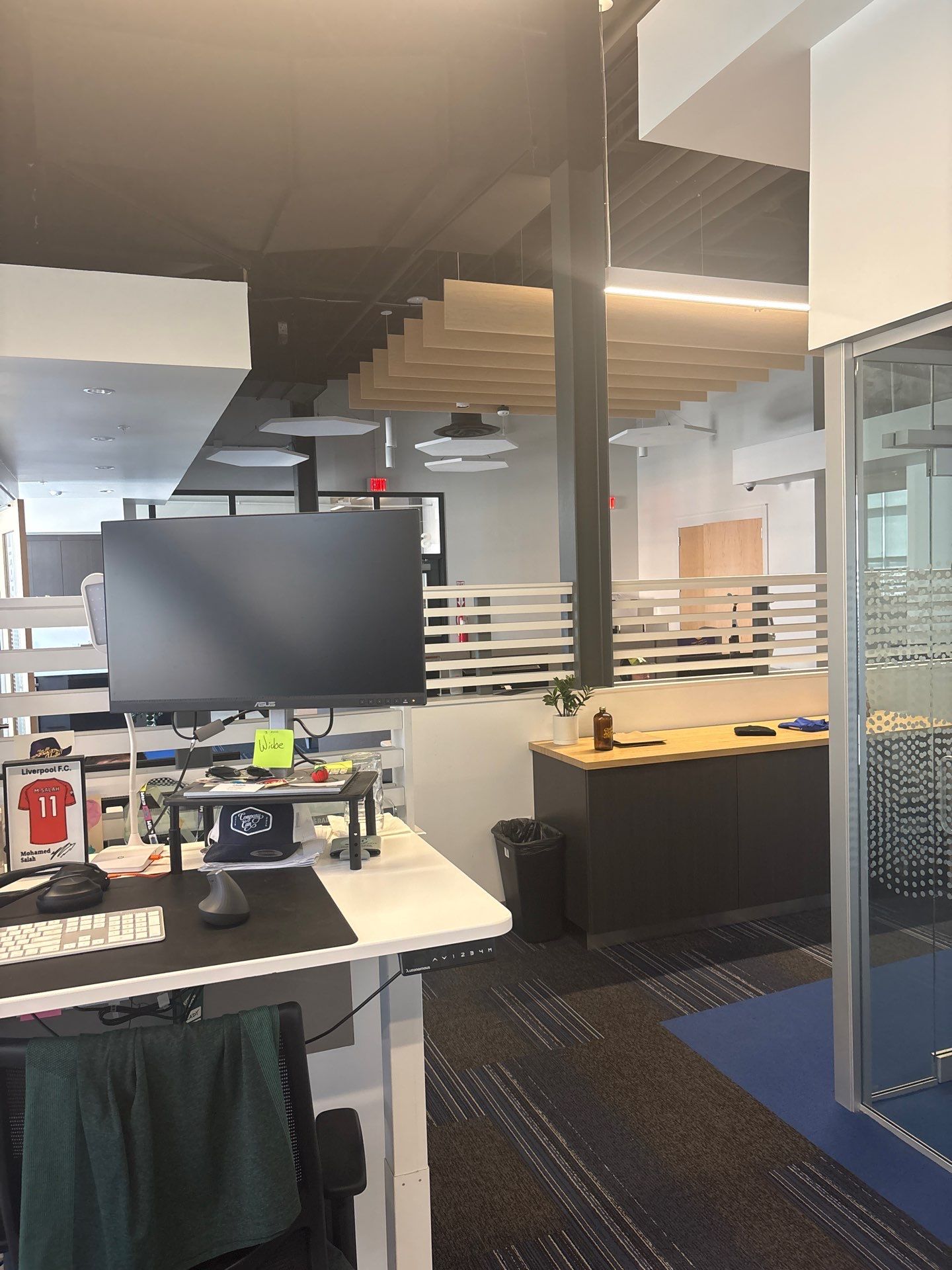 Lincoln Office Interior Remodel with Acoustic Baffles and Glass Walls by CompanyCam Sales Demo